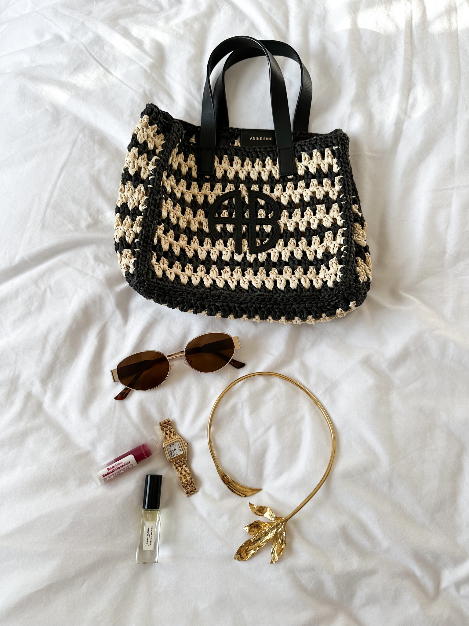 Holiday accessories ✨

Anine Bing Small Rio Rattan Tote Bag, Massimo Dutti Choker, Ego Sunglasses, Sana Jardin Tiger By Her Side Perfume, Gold Watch, RoseGlow Lover Lips Balm 💕

(Linked alternatives)

#LTKuk #LTKstyletip #LTKeurope