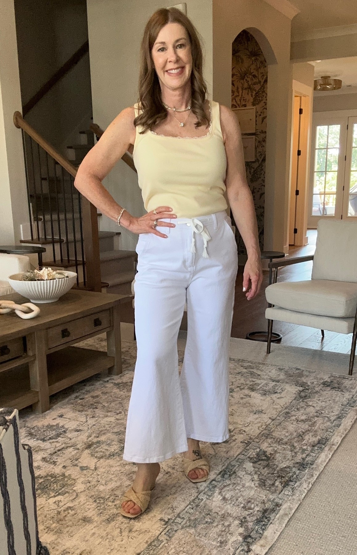 The cutest lightweight cropped flare denim pants! Wearing a small! 
Yellow tank with ruffle detail (size up) 
Wedge sandals
#amazonfashion