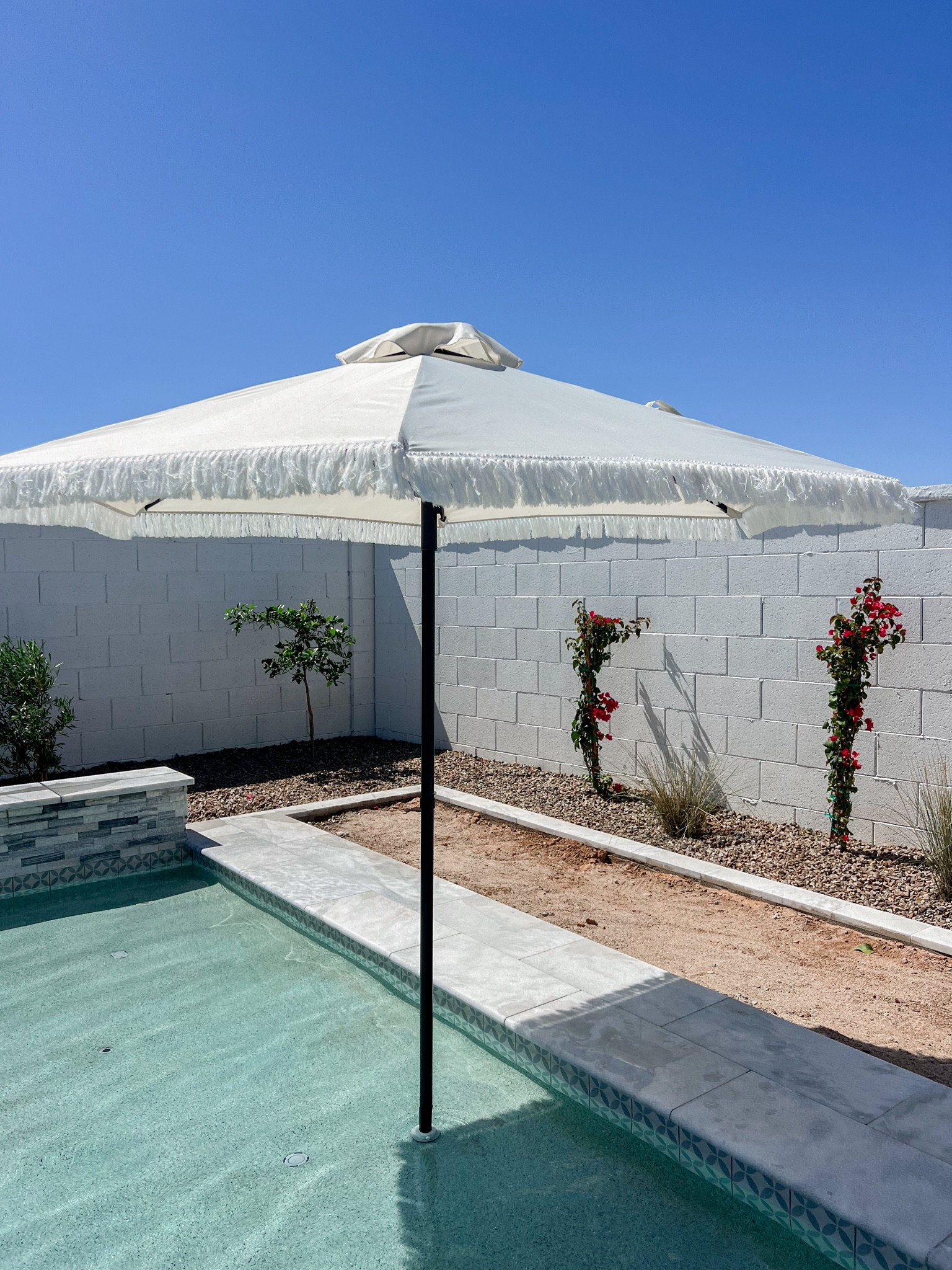 The most adorable umbrella on sale today! This is 7.5 feet and could be perfect in a pool or at a table! Walmart finds, pool accessories, patio decor, budget friendly decor, pool season 

#LTKSeasonal #LTKhome #LTKsalealert