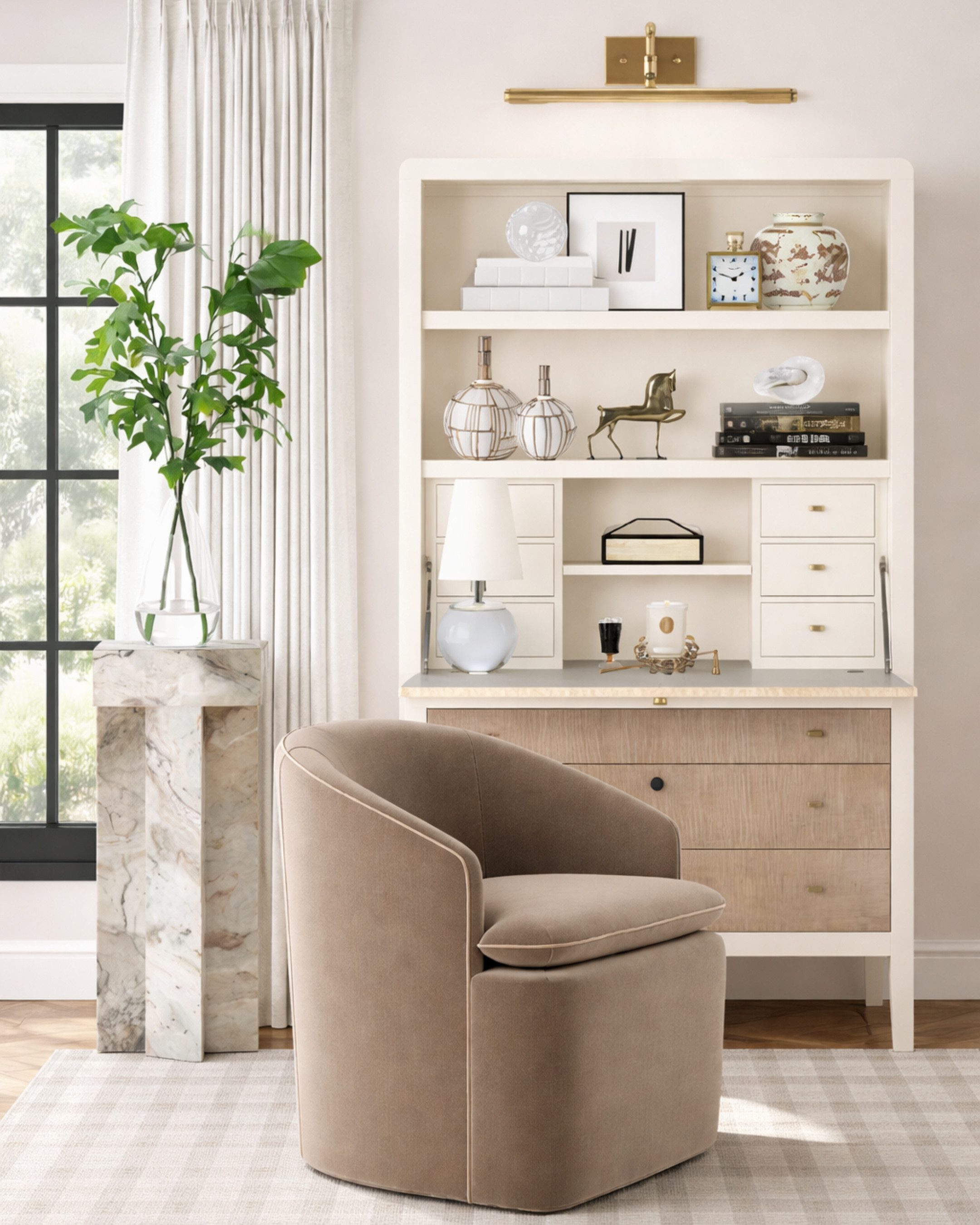 Home office refresh, but make it designer level. ✨

This setup is proof that a workspace can feel just as beautiful and intentional as the rest of your home. The secretary desk with built-in shelving gives you storage, styling space, and a functional work surface without taking over the room. Paired with a curved accent chair, marble pedestal, tailored drapery, and brass picture light, the whole space feels polished, layered, and elevated.

I styled the shelves with neutral decor, sculptural vases, coffee table books, and brass accents to keep everything light, sophisticated, and visually calm — perfect if you want a workspace that still feels like part of your living space.

If you love classic interiors, neutral home offices, timeless decor, and elevated work-from-home spaces, these pieces are the kind that instantly upgrade a room.

Shop the look: secretary desk, curved accent chair, marble pedestal table, brass picture light, neutral rug, modern table lamp, decorative vases, and shelf styling decor. Perfect pieces for creating a designer home office, styled desk area, or chic workspace. ✨ 

 #LTKHome