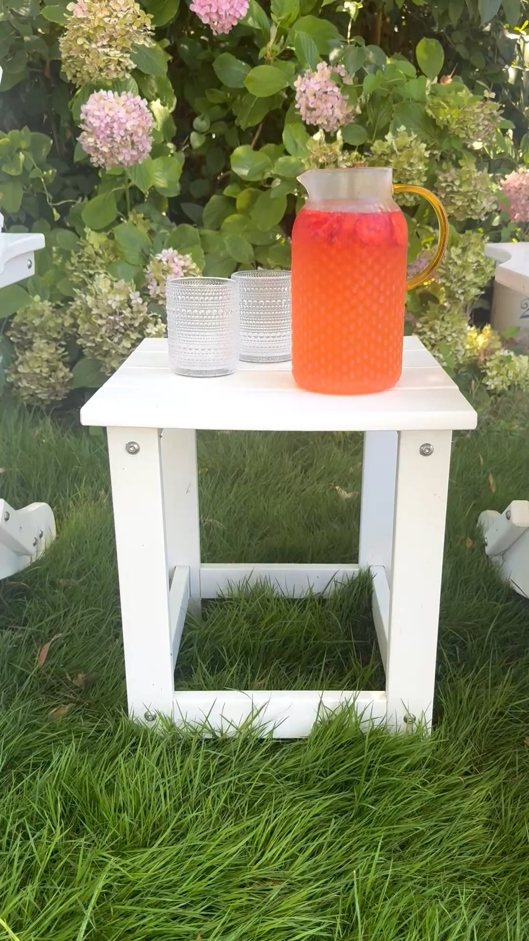 #ad This classic white outdoor side table from @Wayfair is perfect for a pitcher of strawberry lemonade, my hobnail glasses and more! This table is perfect right in between my Adirondack chairs! It is affordable, comes in many colors and is easy to assemble! I bought it two years ago and it’s still going strong ❤️ #wayfair #wayfairpartner #wishyouwerehere #outdoor

#LTKdayinmylife #LTKHome #LTKSaleAlert