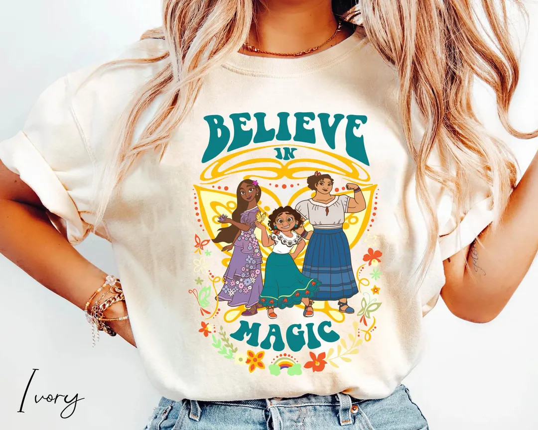 Encanto Mirabel Luisa Isabela Madrigal Believe in Magic Comfort Colors Shirt, Retro 70s Floral Di... | Etsy (US)