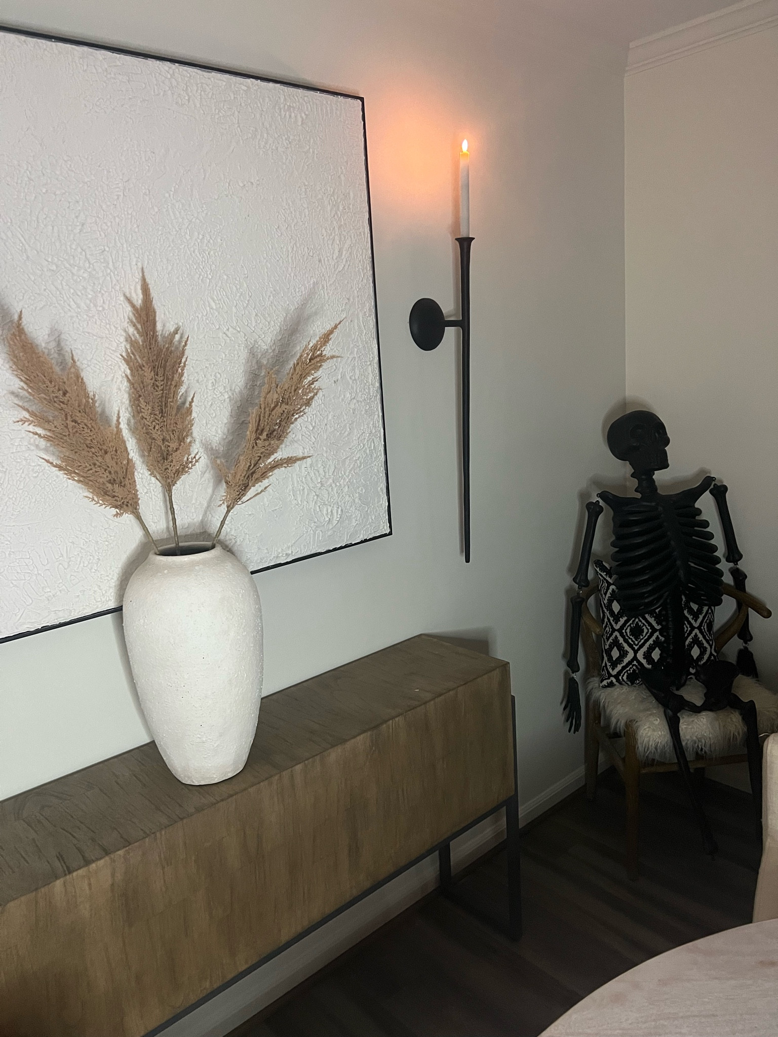 Dining room is Halloween ready 👻Wireless sconces + battery candles = peak cozy level. 

#LTKHalloween #LTKhome #LTKfindsunder100