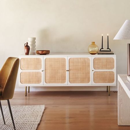 Major markdown from West Elm—Ida Woven Media Console (68"-80") is on *sale* but going fast Get it fast: Holiday must-haves. We love home the breathable rattan mixes with the gloss finish—it is such a fresh modern take on a traditional designs, and of course the plenty of storage for all the holiday hosting essentials. 

#LTKhome #LTKsalealert #LTKHoliday