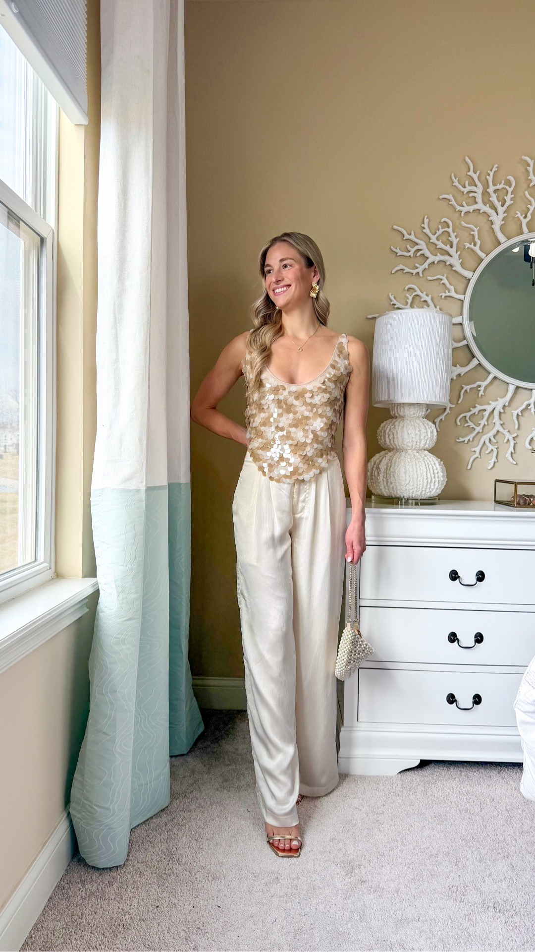 The 12th Tribe shell top + pant set of my dreams 🐚✨ 😍High-end vacation vibes! The ultimate resort wear moment. Wearing an Xs top. It fits but it’s tight. A small would have been better. Pants are a small. I have a little extra room in the waist! 🤎🤎🤎🤎🤎🤎🤎🤎🤎🤎12th Tribe outfit, shell detail top, white vacation outfit, summer matching set, resort outfit women, beach vacation outfit, chic summer set, coastal vacation style. Resort wear. Beach vacation outfit women. Beach vacation outfits women. Beach outfits. Vacation outfits. Shell top. Satin pants.  Spring break outfit. Resort wear 2026. Seashell top. Sea shell top. Neutral outfit  🤍 @12th Tribe 

#LTKTravel #LTKootd #LTKgrwm