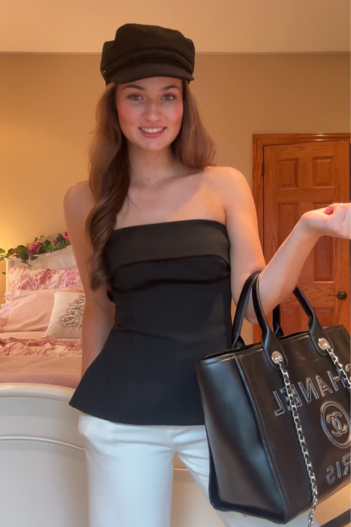 The hat is Ralph Lauren and the link to the bag: https://www.gorchic.com/collections/affiliate_laurenbrown730/products/chanel-shopping-tote-bag-mixed-fibres-calfskin-gold-tone-metal-black?data_from=collection_detail&prefetch_cache=1