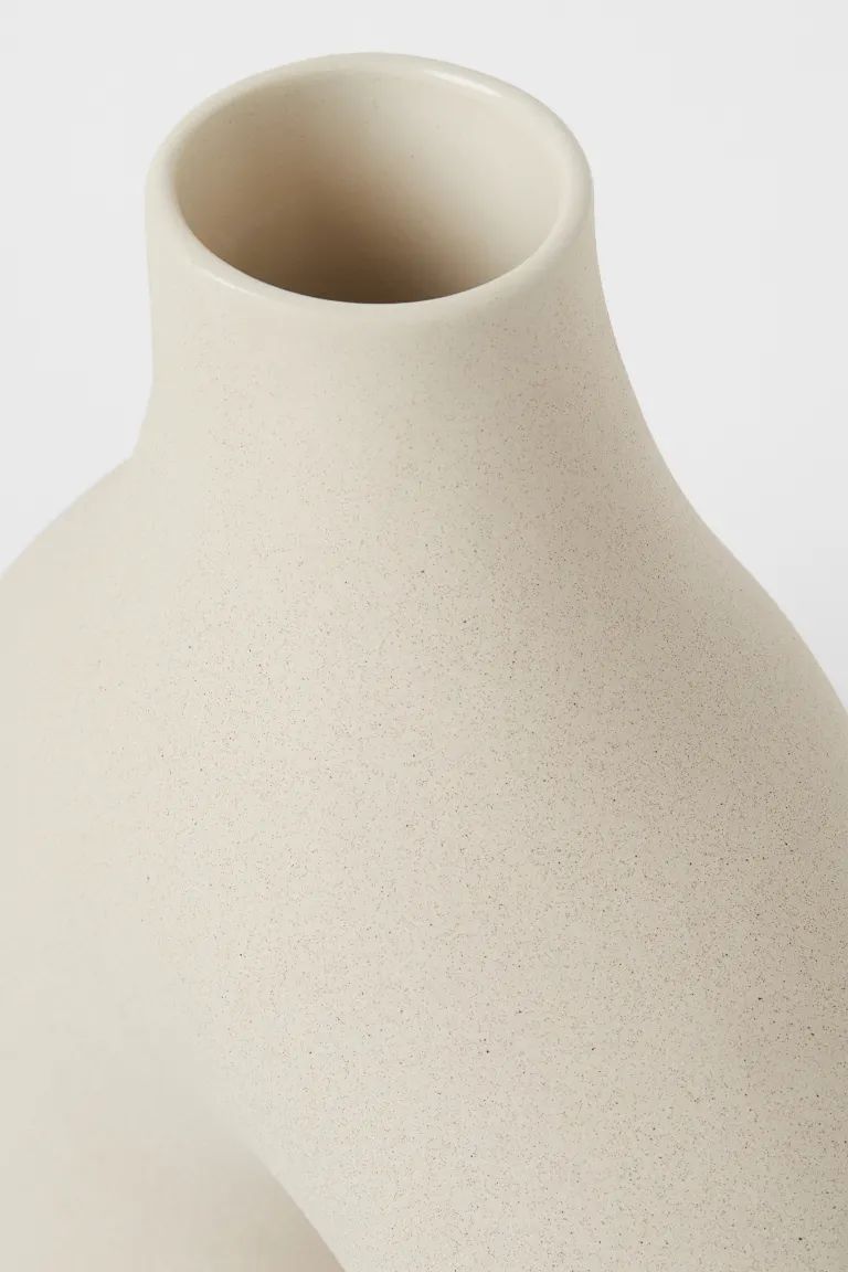 Large vase in glazed stoneware with a soft, irregular shape and two legs with different widths. D... | H&M (US + CA)