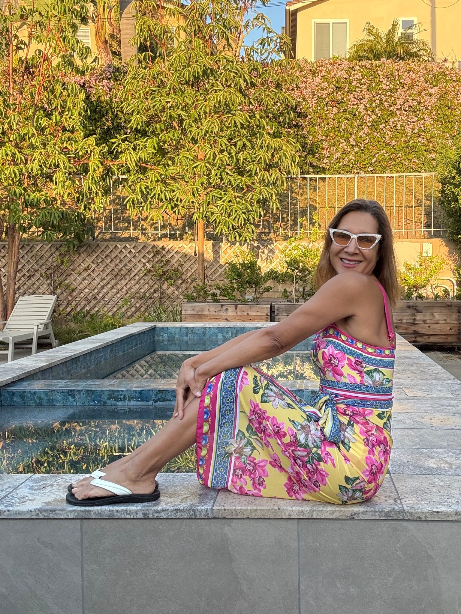Celebrating spring with a new swimsuit. I do love the bright colors on this one piece and sarong wrap cover up. Styling with white sunnies and Ohana flip flops because arch support makes my day.

#LTKOver40 #LTKSeasonal #LTKTravel