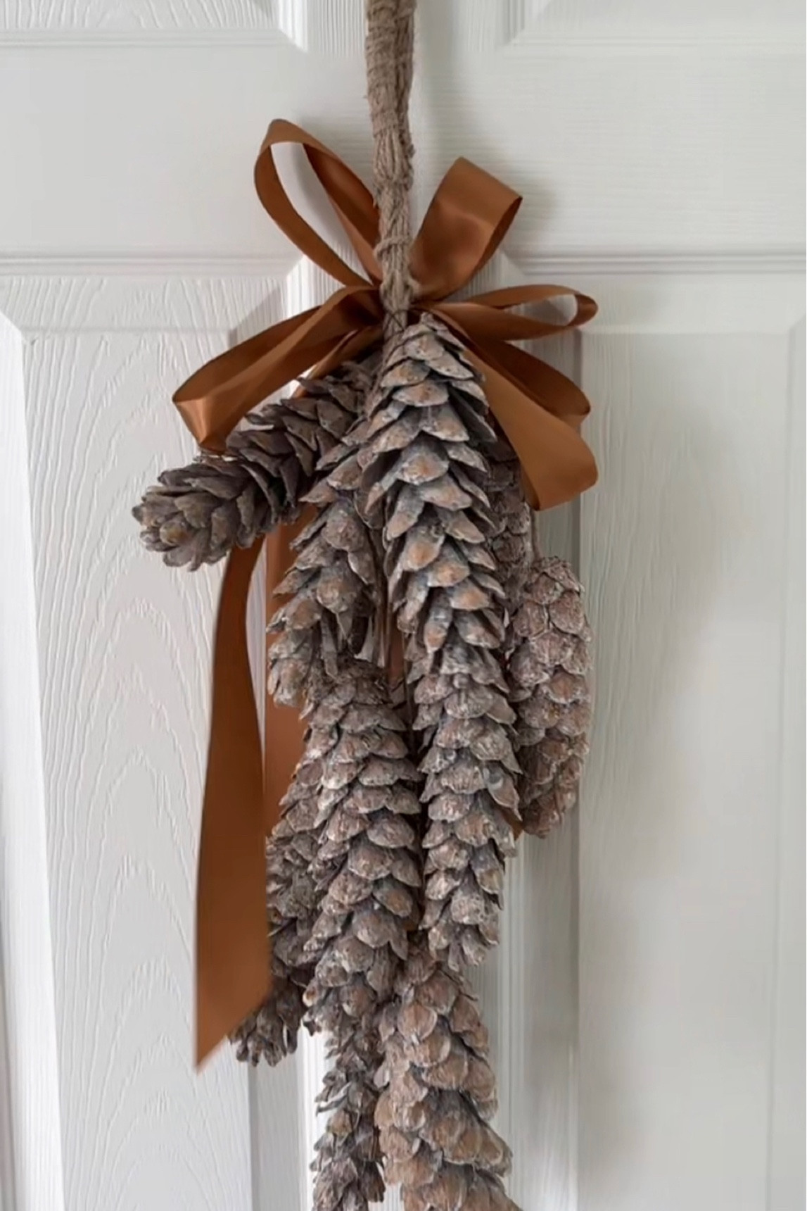 Farmhouse fall decor hanging pinecones

#falldecor #farmhousefalldecor #fallhomedecor 

#LTKstyletip #LTKunder100 #LTKhome