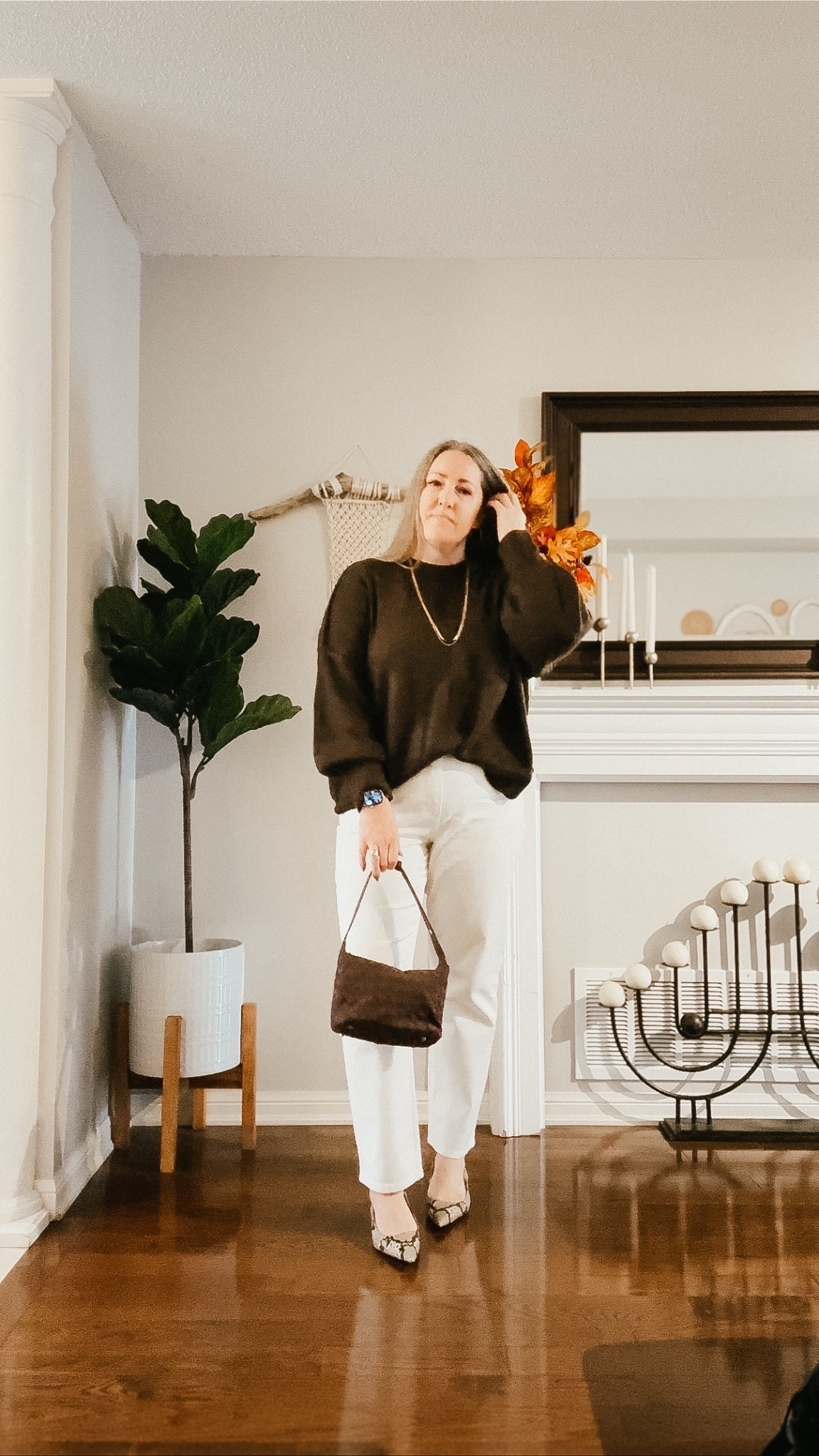 Chocolate brown sweater
Brown suede bag
Snake print heels

#LTKFindsUnder50 #LTKShoeCrush #LTKOver40