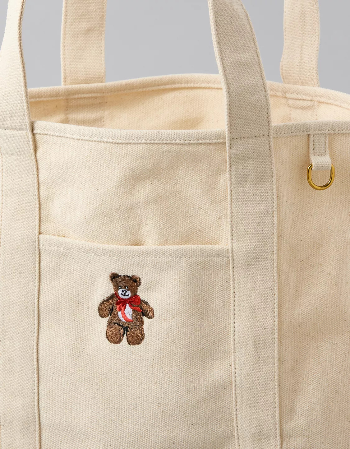 An everyday carryall with an embroidered teddy bear that's perfect for holding all your essential... | American Eagle Outfitters (US & CA)