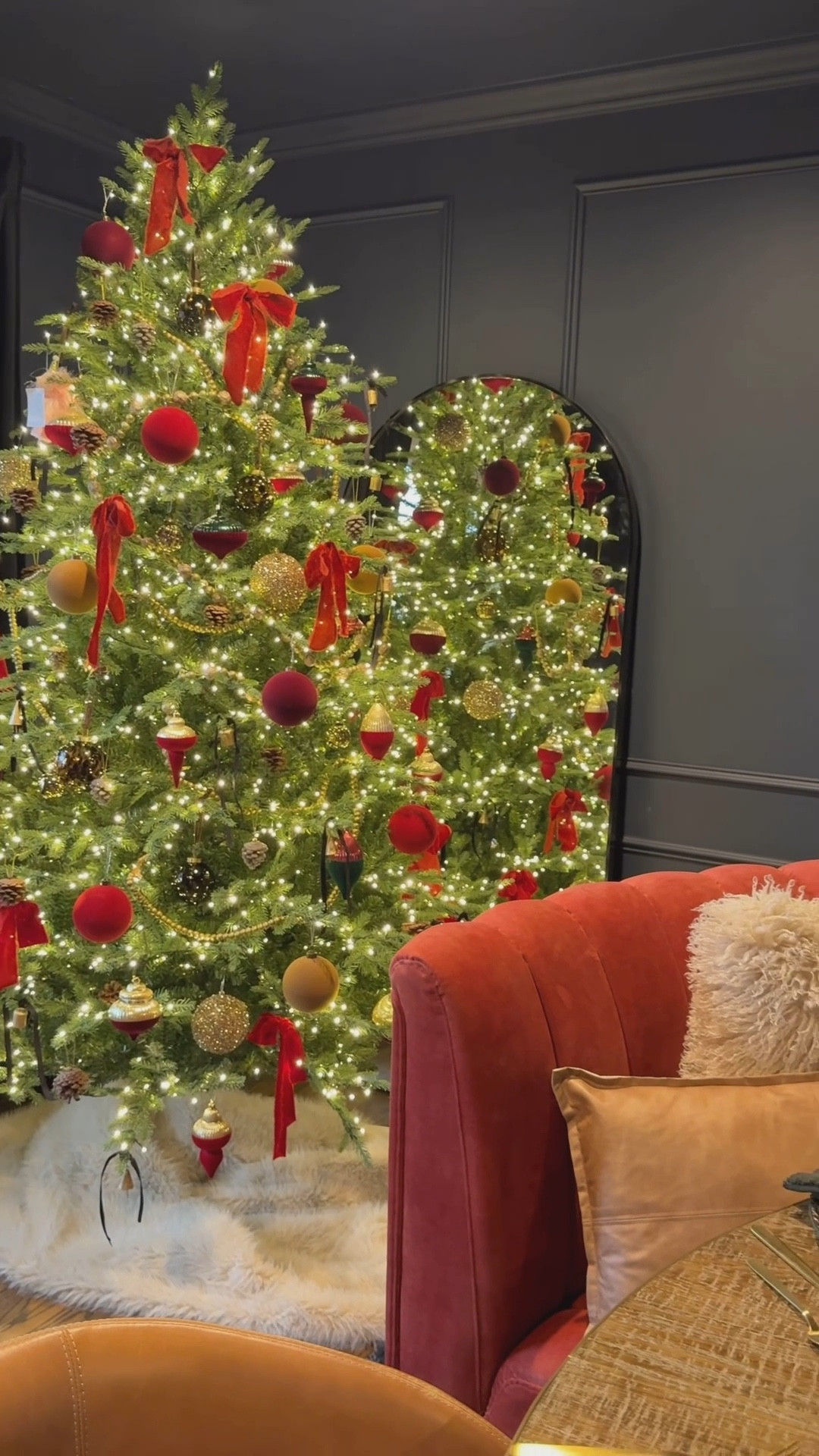 i hired an INCREDIBLE designer to bring a ralph lauren inspired christmas to life, so you don’t have to! annnnd, we did it on a budget…think target, amazon and walmart.

steal it allll, or just take the elements/moments that work in your home! 💫 

my favorite details…
• the horsebit buckles adding RL charm to the gift wrap
• the gold trays that scream luxury, but are actually $20
• the luxe velvet ribbon and vintage bells on the staircase, that are actually from amazon. 📦 
• the most beautiful taper candles… from walmart! 🤯
• leather napkins ties, that are actually curtain ties! 🤫
• the bright red wreath from walmart which we elevated by removing the small red ribbon and replacing with a big black velvet ribbon. 🖤
• the oversized bell with red ribbon sitting pretty on the bar shelves. 🔔❤️

annnnnd, when i saw “we”, what i actually mean is jennie! 
@jenniecornell you are a TALENT! thank you so much for  this beautiful room!! 😘 


ralph lauren christmas. christmas nostalgia. home decor. decorating for the holidays. holiday decor. 

#LTKHoliday #LTKHome #LTKSeasonal