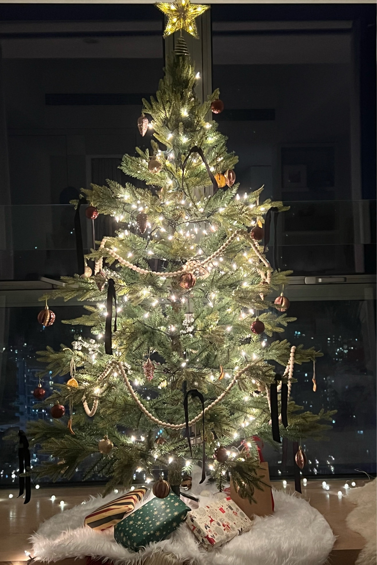 Merry Christmas Eve. Stockings are hung and cookies are out for Santa. This artificial tree looks so real I can’t stop staring at it.

#LTKHoliday #LTKunder50 #LTKSeasonal