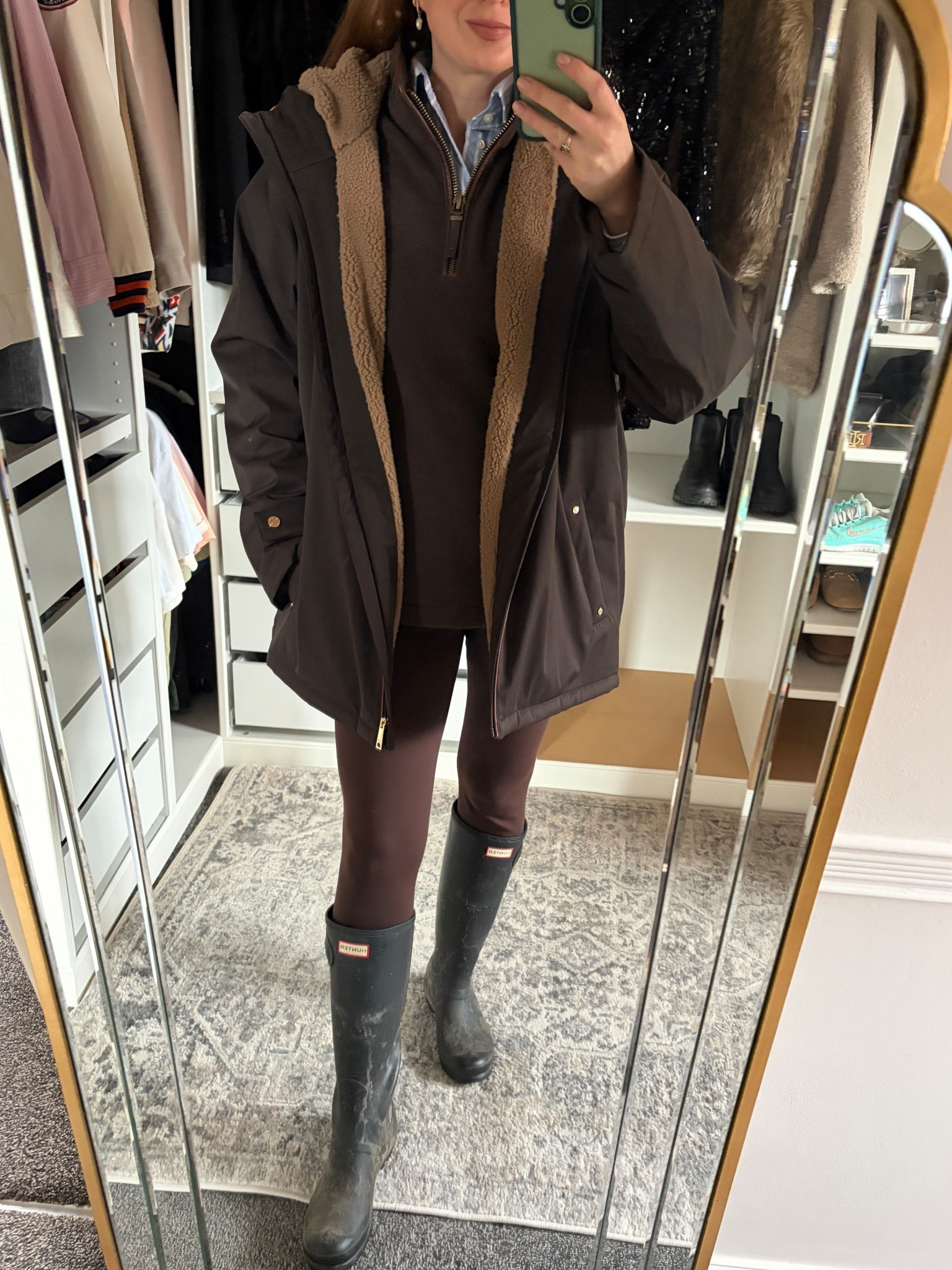 A classic rainy-day look in rich brown tones. Living in this waterproof Coat, half-zip fleece layered over a blue shirt, streamlined leggings, and timeless Hunter boots. Practical, polished, and effortlessly country-chic. 🤎

#LTKuk #LTKluxury #LTKwinter