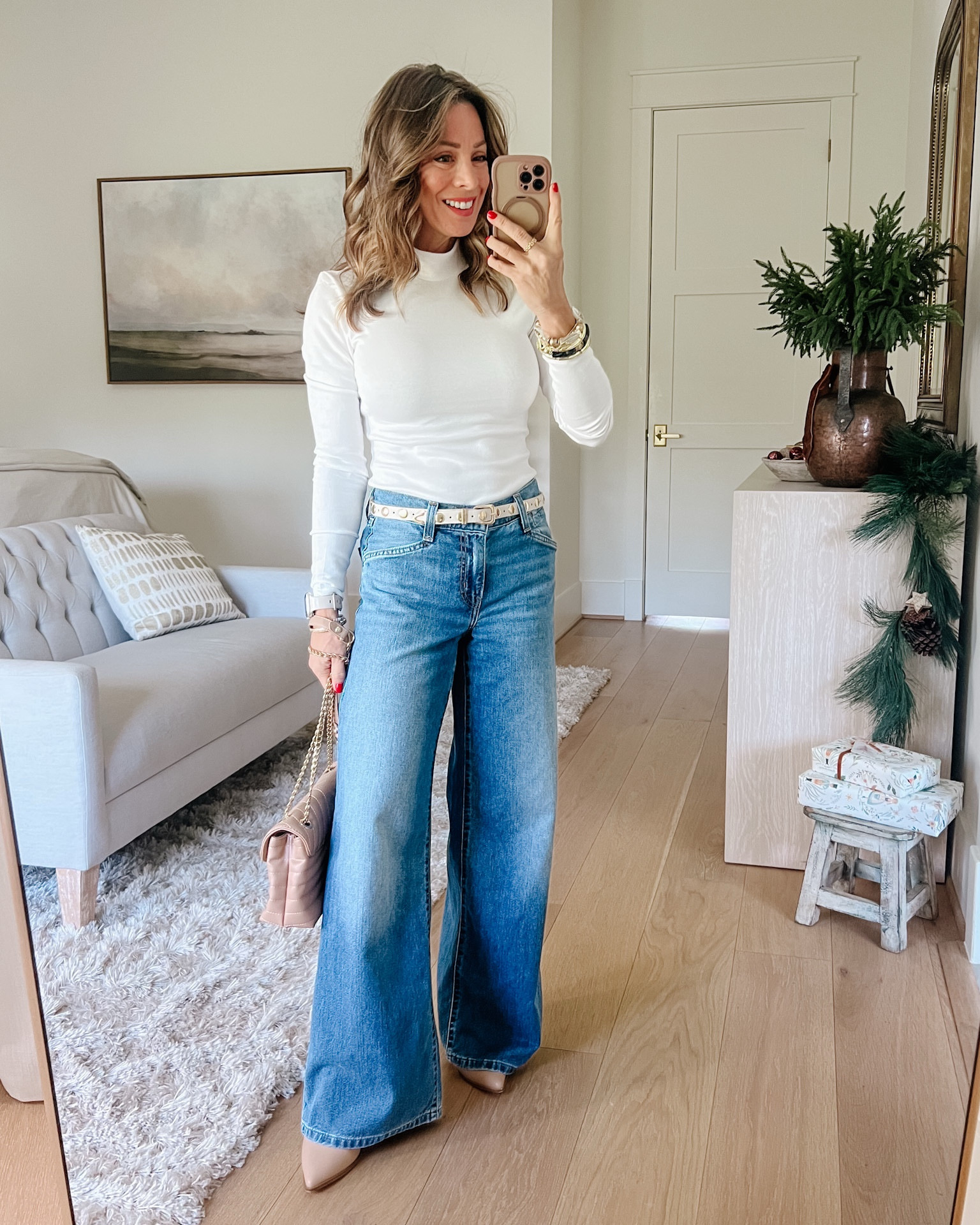 Amazon winter style 🤍 White mock neck and Levi’s wide leg jeans 

Top Fit: I’m wearing a Small

Jean Fit: I’m wearing a 24

#LTKPetite #LTKSaleAlert #LTKmomlife