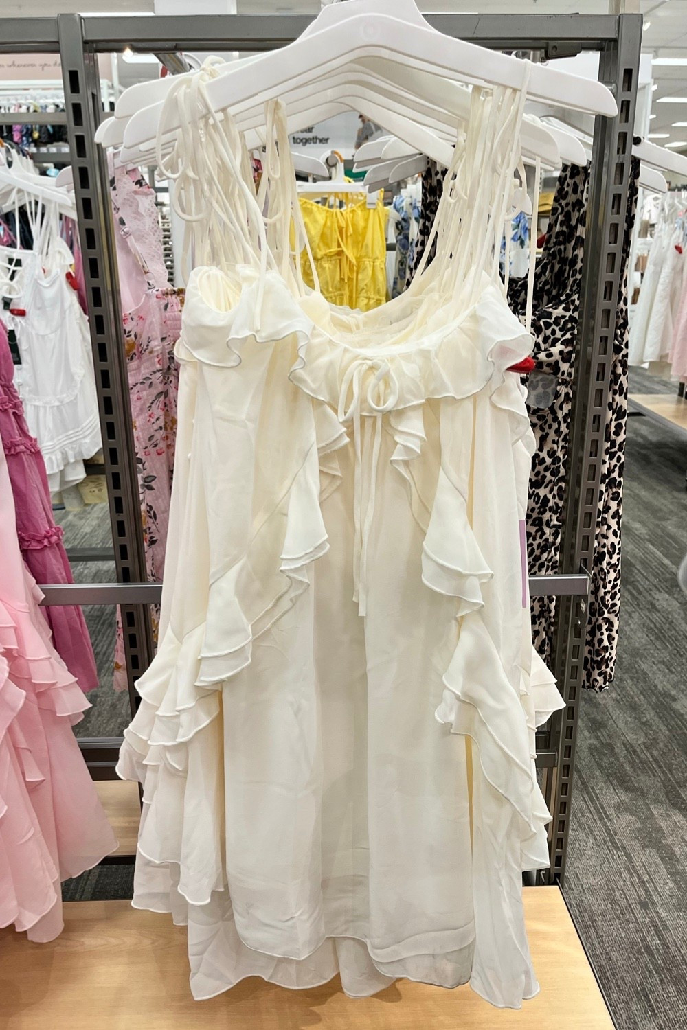 Pretty spring summer white dress at Target this week. 

Country concert dresses, spring dresses, resort wear 2026, date night dresses, bachelorette weekend, bachelorette party dresses, honeymoon packing, bridal shower dresses, engagement photo shoot, festival dresses, graduation dress. 

#LTKFestival #LTKWedding #LTKSeasonal