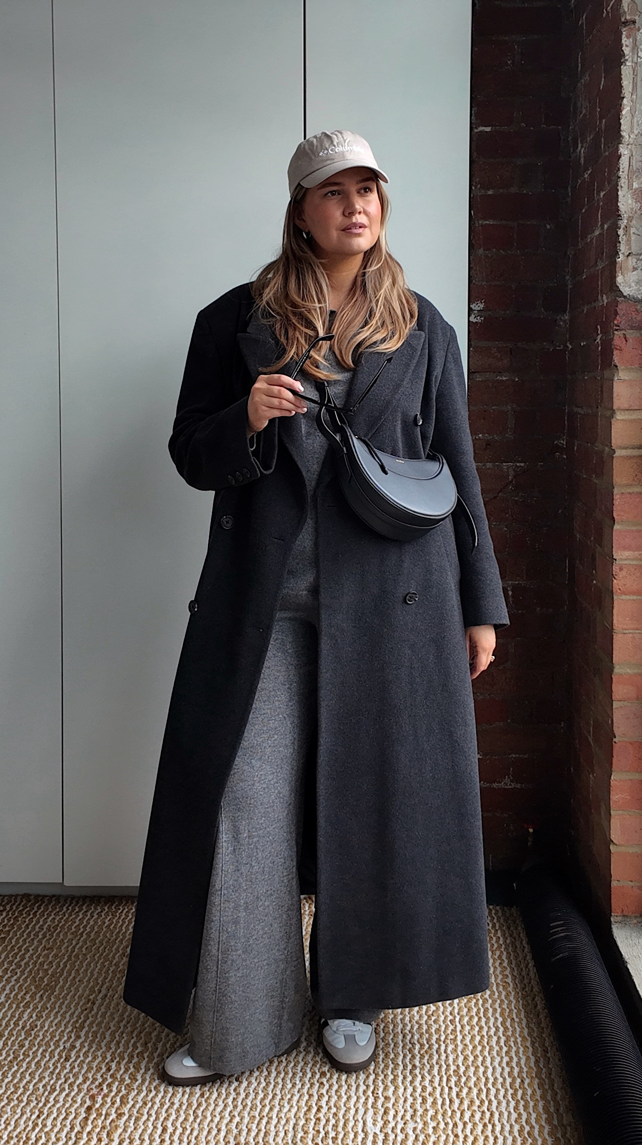 How to wear loungewear out the house..?

Uniqlo airism white t-shirt [XL]
Grey cashmere loungewear set [3L]
Uniqlo black thermal layer [XL]
Anthropologie black coat [UK 16]
Beige cap [dupe tagged]
Sambas adidas
Rayban sunglasses
Polene bag [dupe tagged]
Silver hoops