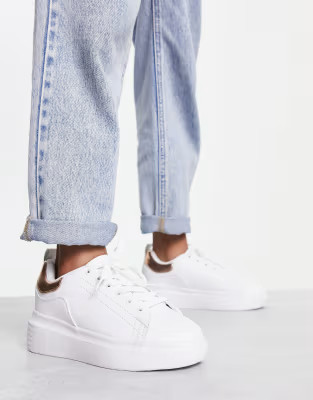 Truffle Collection trainers in white with rose gold tab | ASOS (Global)