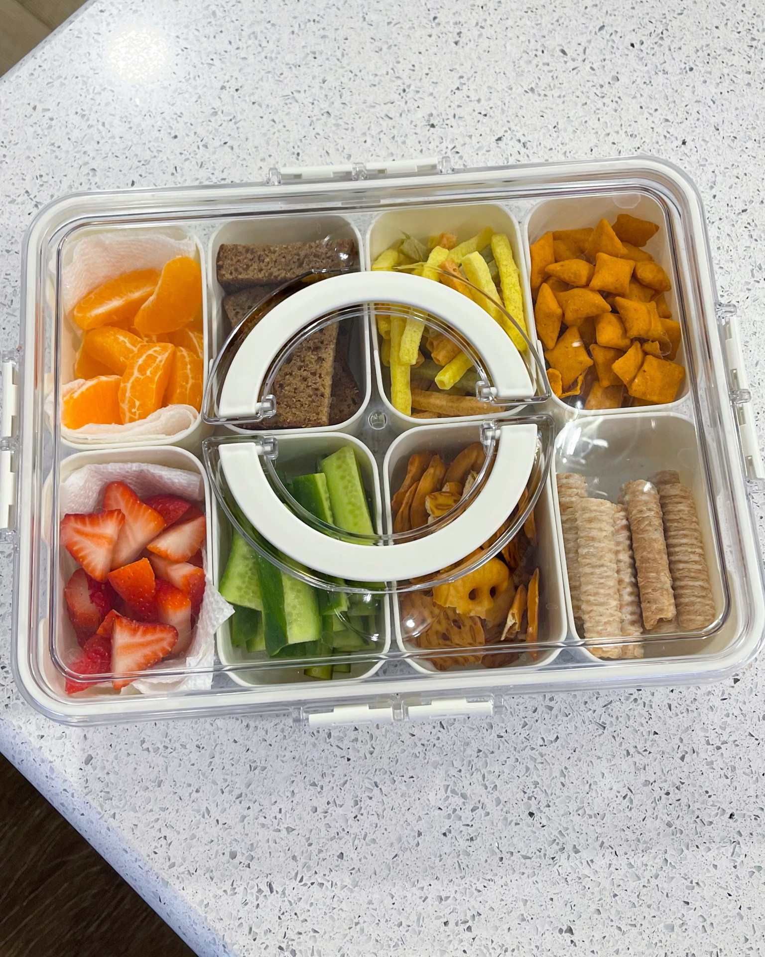 Found the perfect serving tray for play dates! This snackle box has 8 compartments that are perfect for sliced fruit, pretzels, chips, nuts, veggie straws, and more 😍🫶 

Love the snaps on each side of the lid and the carrying handles for easy transporting and packing - I could see using this in a road trip or picnic day too!

Under $20 find 🩷🩷🩷🩷


#LTKTravel #LTKSeasonal #LTKFindsUnder50