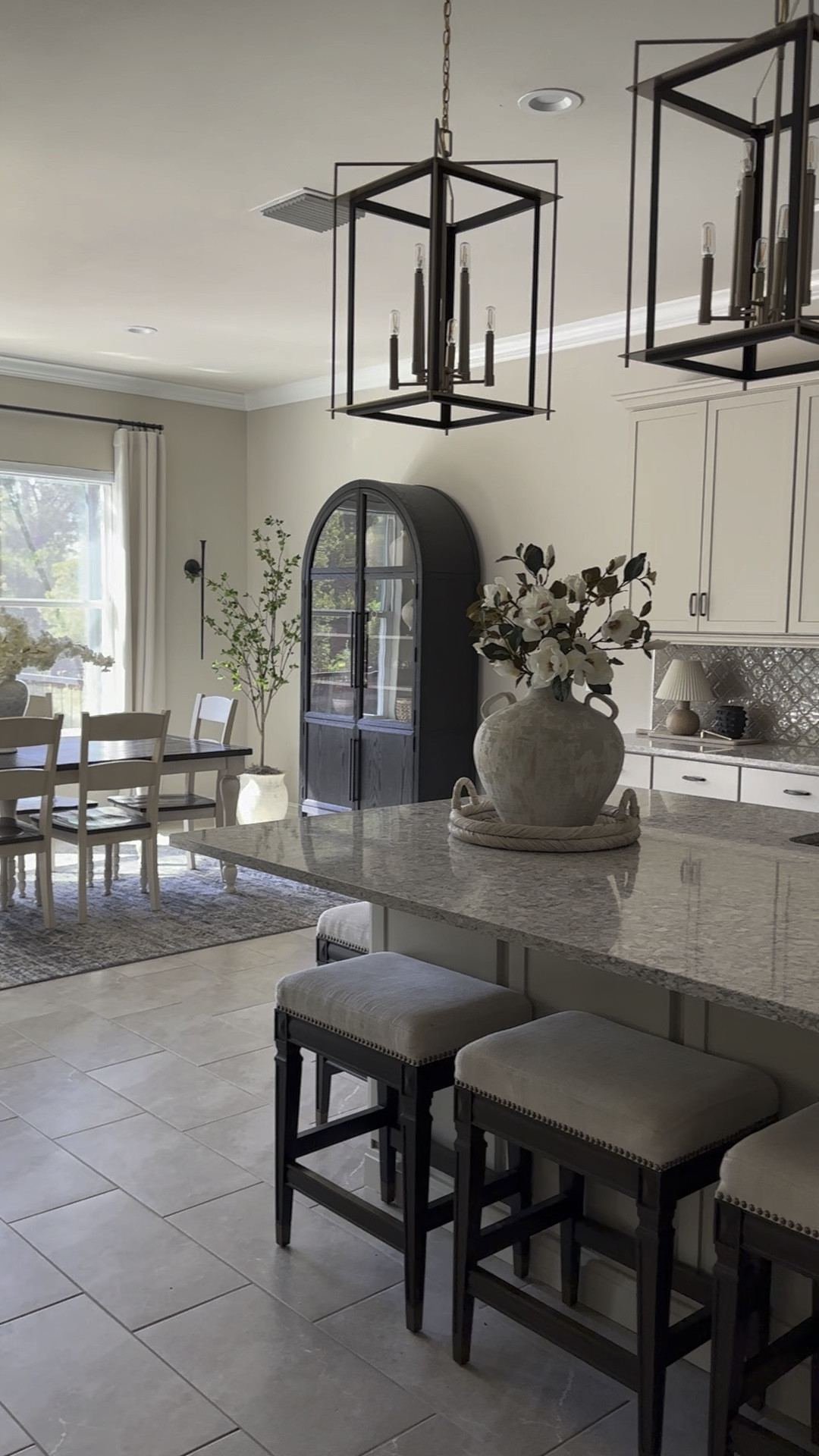 Nothing like a clean kitchen right? This Hattie cabinet from Arhaus is a dream. Worth the investment. 

Arhaus cabinet, arched cabinet, black cabinet, Hattie cabinet, Frontgate barstools, cb2 vase, terracotta vase, Faux magnolia stems, zgallerie sconce 

#LTKunder100 #LTKhome