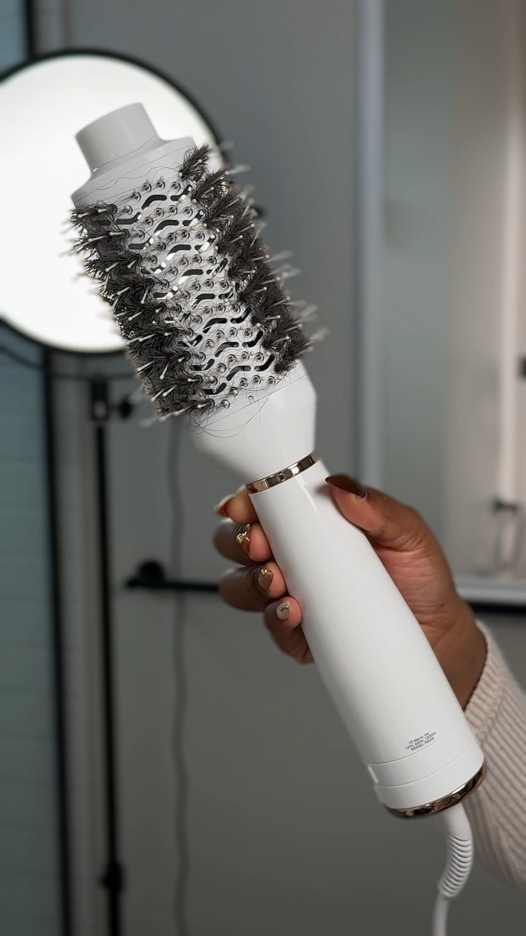 You need a new blow dryer and here’s why.

Your silk press (or flat iron results) are only as good as the blowout underneath it. If your hair isn’t smooth before you even touch a flat iron, you’re already using too much heat and wasting time.

This one-step smoothing + volumizing dryer brush completely changed my routine. It dries my hair super fast while starting the smoothing process early, which means:
• less time blow-drying
• less time flat-ironing
• less heat overall

The even airflow and heat distribution help reduce frizz and protect moisture, so I get a smoother finish without over-drying my hair. The bristles are gentle and glide through without tugging, snapping, or breakage, which is huge for me, especially during silk press season.

I love that I can customize the heat and speed depending on how I’m wearing my hair. Whether I’m prepping for a sleek silk press or just want a smooth, voluminous blowout, this tool does the heavy lifting before styling even starts.

If your silk press isn’t lasting, feels stiff, or takes forever, it’s not your flat iron. It’s your blow dryer.
This is the upgrade your routine needs.

#LTKHoliday #LTKGiftGuide #LTKBeauty