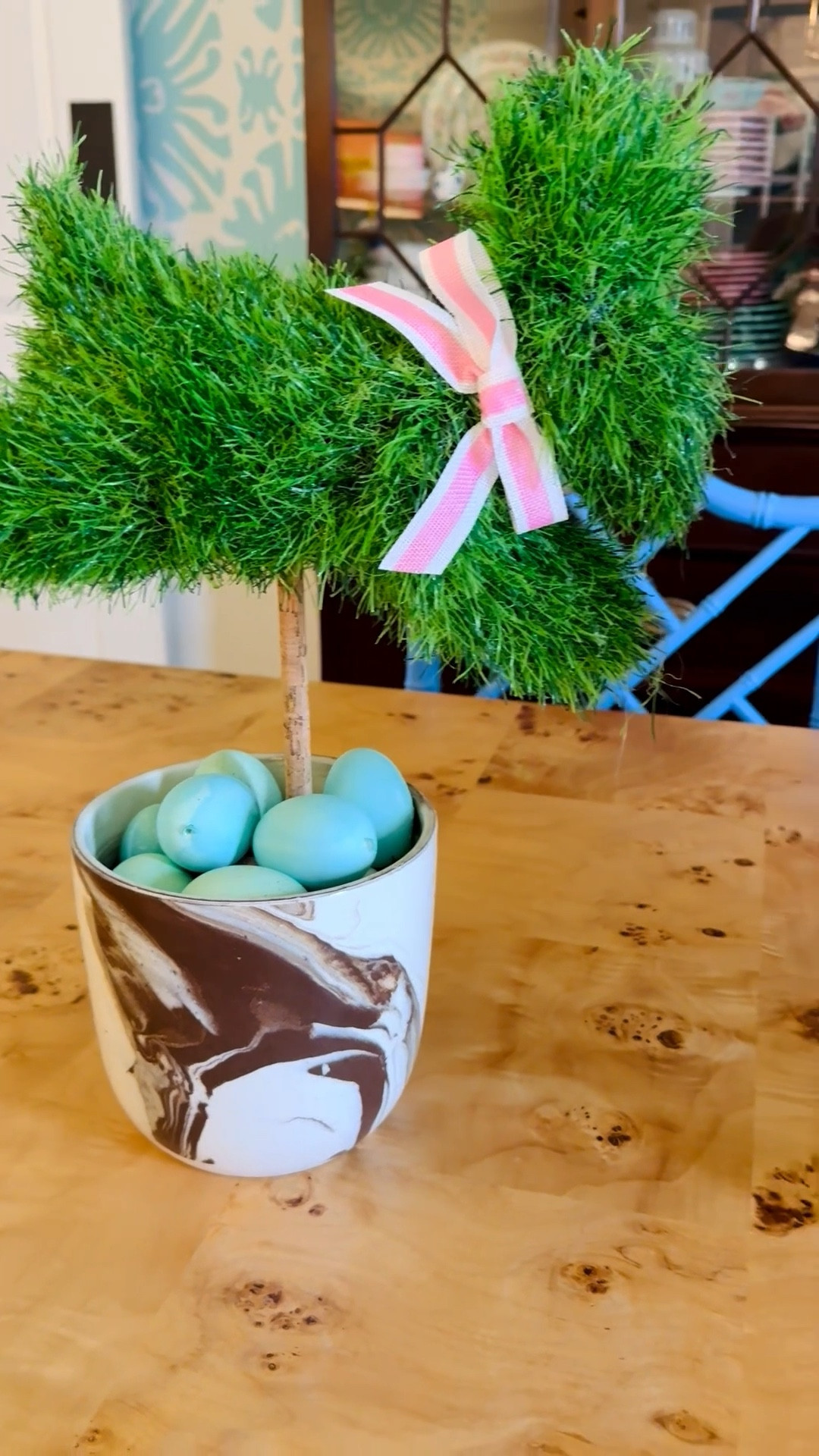 Moss bunnies 🐰. 

They fit in any vessel you already have. Add some eggs and voila instant tabletop decor 🥚 

Burlwood table 

Chinoiserie chairs 🪑 

Ivory tulip 🌷 chandelier 

Pleated block print chandelier shades (comes in several colors) 

#LTKSeasonal #LTKHome #LTKdayinmylife