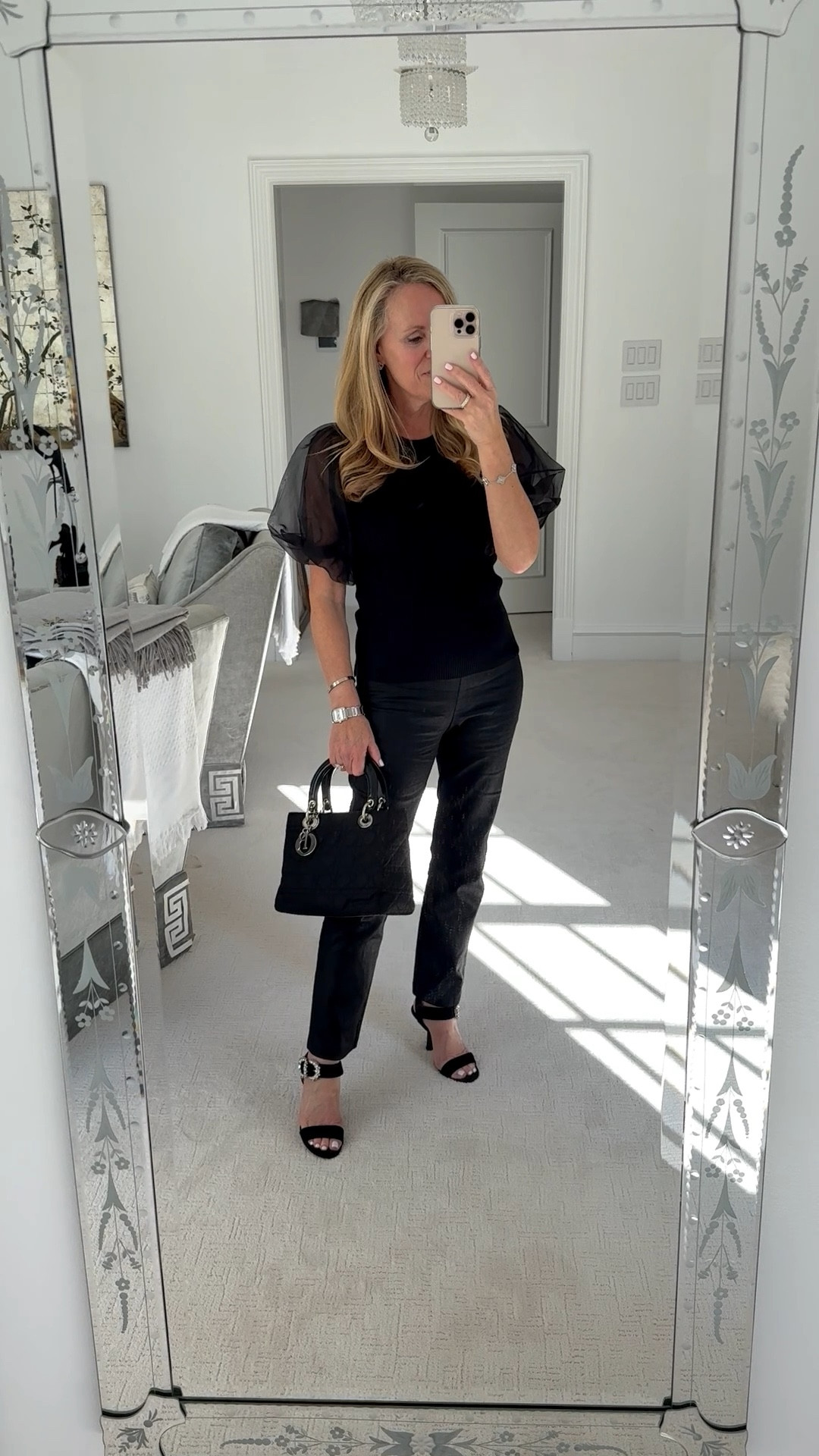 Outfit idea for a holiday tea or holiday party

Fine ribbed sweater with organza puff sleeves fits true to size. I’m wearing XS. 

Tucker neck black waxed Ashford pan. The perfect pant for any occasion flat front zips on the side also fits true to size. I’m 5’2” tall and wearing S. Check waist measurements to be sure for your fit  
Paired with shoes with a crystal detail and black handbag 

#LTKdayinmylife #LTKOver40 #LTKootd