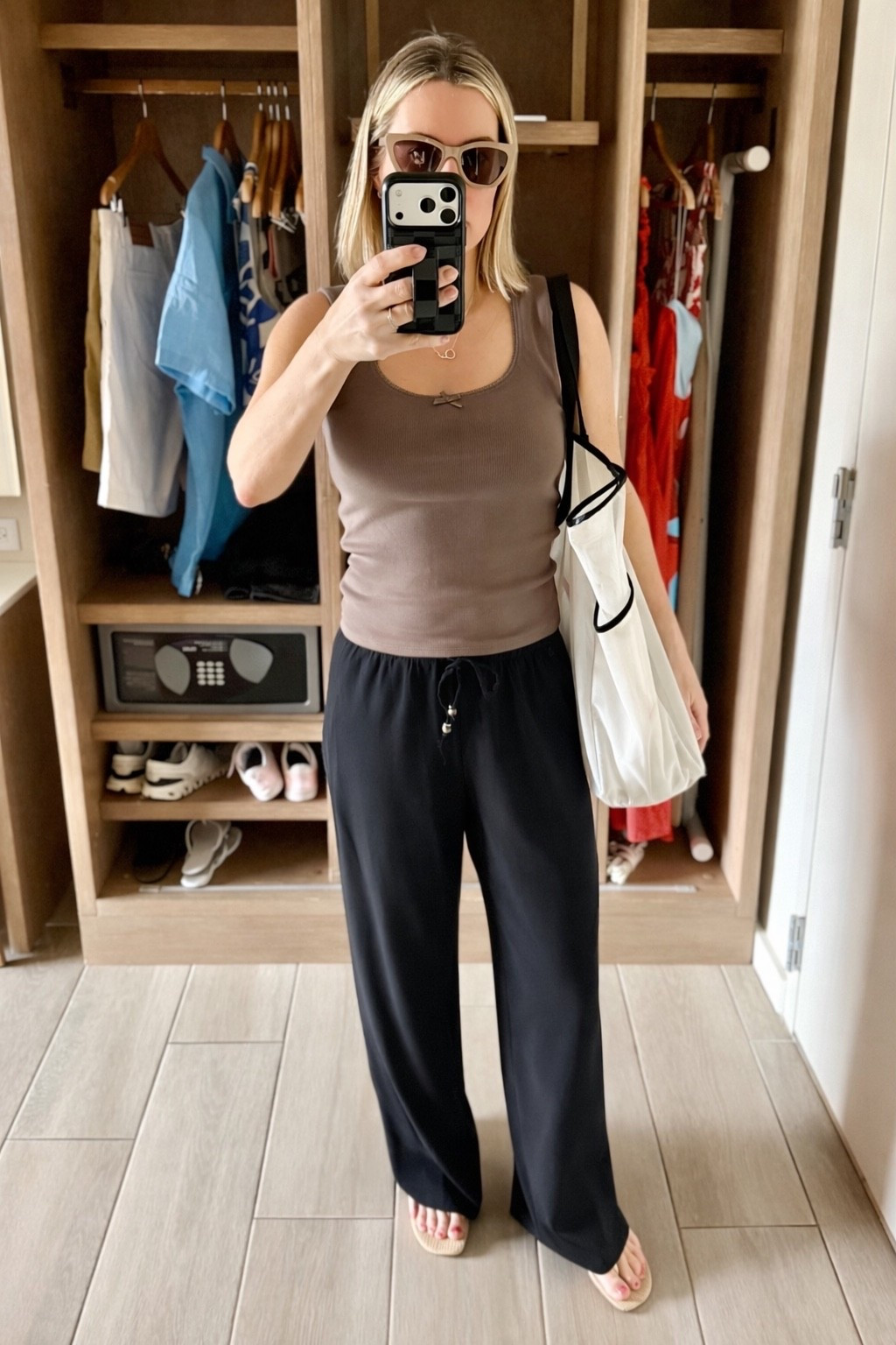 Casual vacation outfit for a day of shopping. This is another tank top I grabbed last minute at Target. Can’t find it online to link. Pants are Zara. 

#LTKOver40 #LTKootd #LTKTravel