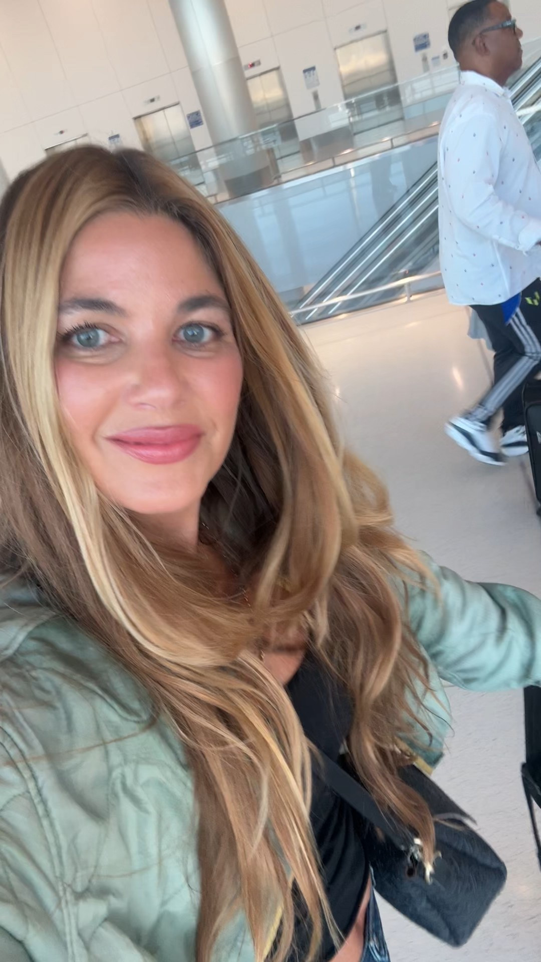 Travel ready and headed to the LTKCon. ✈️ 
Tank: 💯 cotton with a shelf bra so you can skip the bra! I buy this tank in multiples (size medium) 
Jeans: 26 and delightfully oversized 
Shoes: TTS
Jacket: sold out but will link similar
This suitcase holds EVERYTHING and then some and my carryon bag is equally capacious  

#LTKBeauty #LTKStyleTip 

#LTKCon