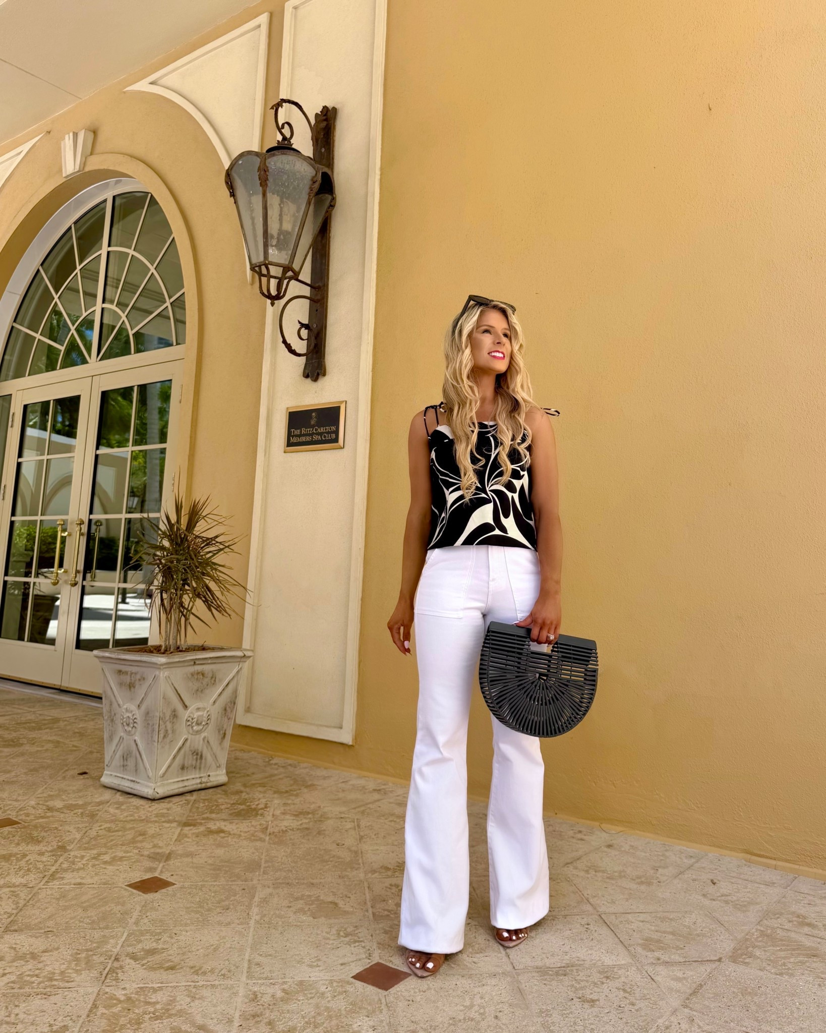 RESORTWEAR  OUTFIT! Tropical tank top + highwaisted white jeans from @Express styled as a vacation outfit, resort outfit, + summer outfit! 

This floral cami has a matching maxi skirt so it can also be styled as a matching set. 

resortwear 2026, tropical outfit, highrise jeans, white denim, flares, white pants, matching skirt set, vacation skirt, resort skirt, coord set, floral skirt

#DressToExpress #gifted #ExpressPartner #liketkit

#LTKTravel #LTKootd #LTKSeasonal