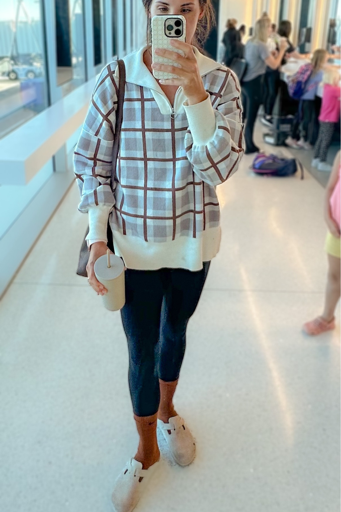 Functional airport travel outfit! 

I love a jumpsuit for comfort, and the oversized quarter-zip sweatshirt gives coverage to slip it on and off for bathroom trips. Birkenstocks are super comfortable for long terminal walks, and socks are just a must.

#quarterzip #jumpsuit #airportoutfit

#LTKfindsunder50 #LTKtravel #LTKstyletip