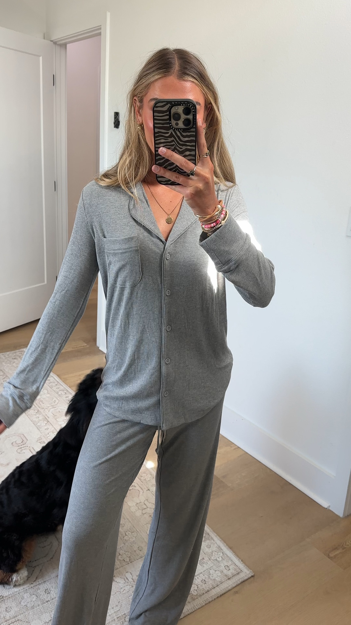 @skims size xs Your old pajamas can’t compete with this soft, ultra-comfortable sleep set. Features a slightly oversized button-up top with long sleeves, a chest pocket, and piping details. The straight leg pants have a relaxed fit and a stretchy waistband with an adjustable interior drawstring. Fits true to size.

#LTKootd #LTKdayinmylife #LTKgrwm