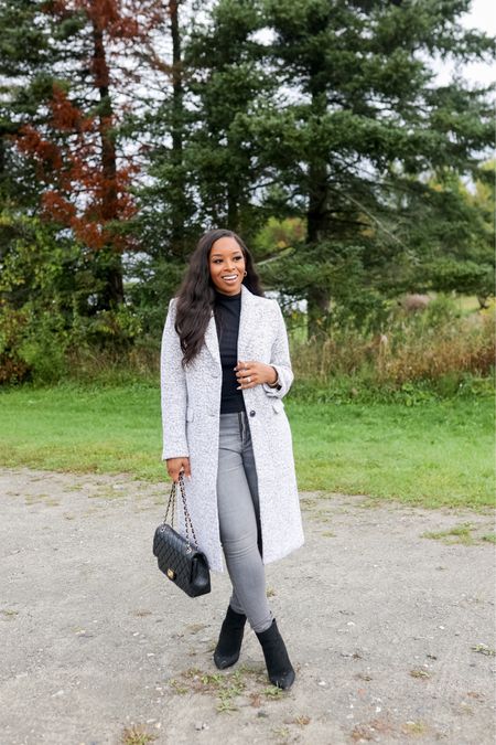 My Fall Outfit includes: Grey Trench Coat. Black turtle neck. Grey Skinny Jeans. Wearing a medium in the top. Coat is a medium perfect to wear in colder temps. Black booties and Chanel dupe bag. Grey skinny jeans are a size 30. 

#LTKstyletip #LTKcurves #LTKSeasonal
