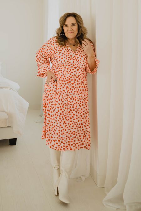 Sweet abstract polka dot dress. You can call it a Valentine Dress. I call it a pretty dress. For all the occasions. Wedding guest too! Dress is on clearance for $30! 

I’m in a L. Ties at the back. 

Linking similar white boots  

#LTKunder50 #LTKwedding #LTKFind