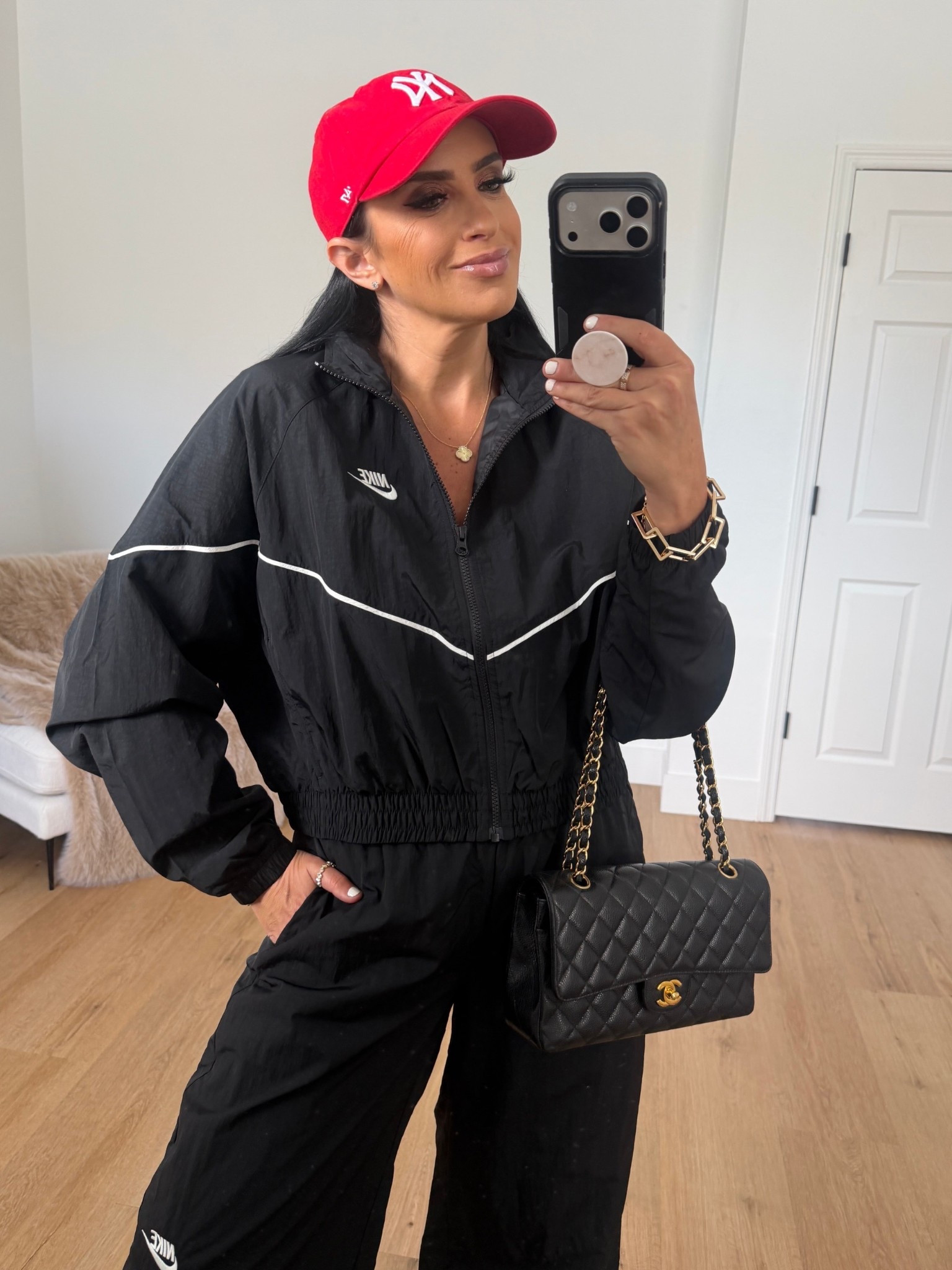 Nike Sportswear Windrunner Woven Jacket Speed wearing size medium. Sportswear Wide Leg Woven Pants wearing size small. 