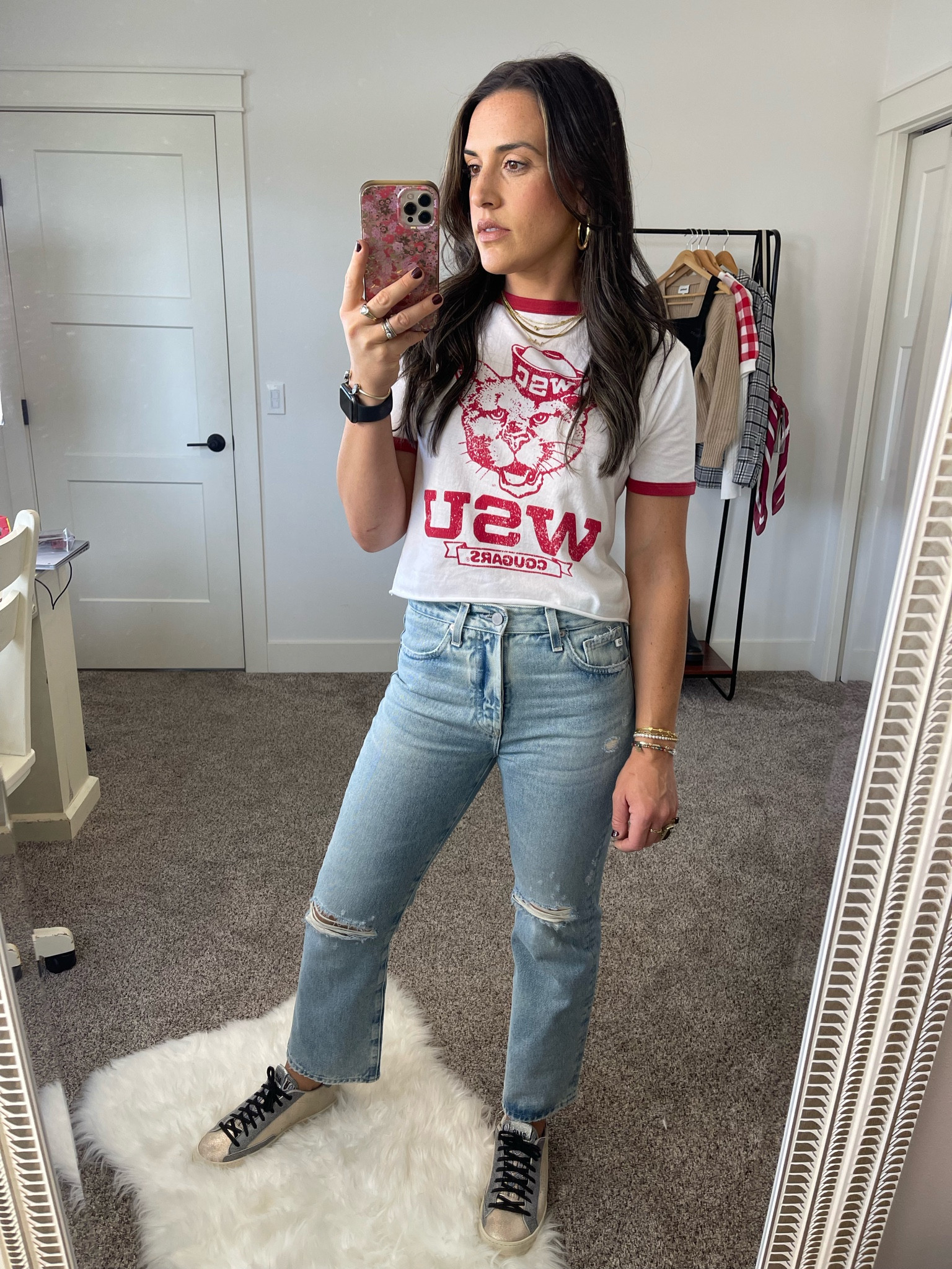 Game day outfit idea | vintage tee: distressed cropped flare jeans | fancy sneakers | gold jewelry | college football game day outfit idea | causal chic | p448 sneakers | light wash denim | wsu | 

Jeans run small. I dozed up one. Zero stretch. Rigid denim. 
P448s fit tts  
Lipstick: yash

#LTKSeasonal #LTKFind #LTKshoecrush