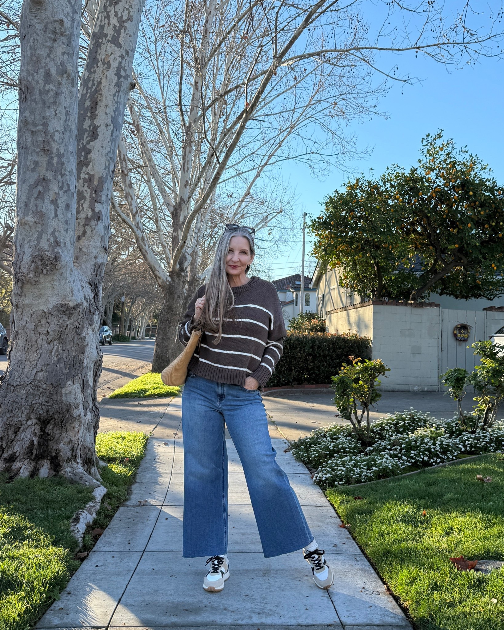 Easy casual spring ootd. Cotton sweater, stretch jeans, & suede sneakers - all true to size. 

#LTKOver40 #LTKMidsize #LTKootd