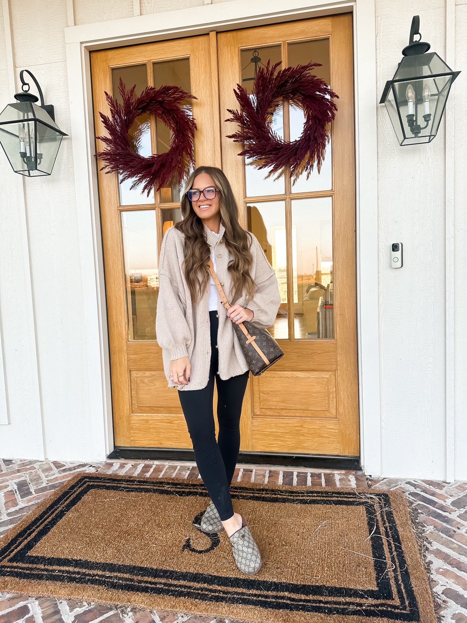Casual fall outfit for morning drop off. I love these designer slip ons, definitely worth the investment, I wear them with so much! This cardigan has really cute details like gold buttons and a mock collar. I’m wearing the small and it’s still very oversized. And y’all know I love the heynuts brand leggings from Amazon, great quality, I wear the medium! 

I was able to source my Louis Vuitton CarryAll from a resale site, I use this as my everyday bag / diaper bag! 

#LTKStyleTip #LTKSeasonal #LTKFindsUnder100