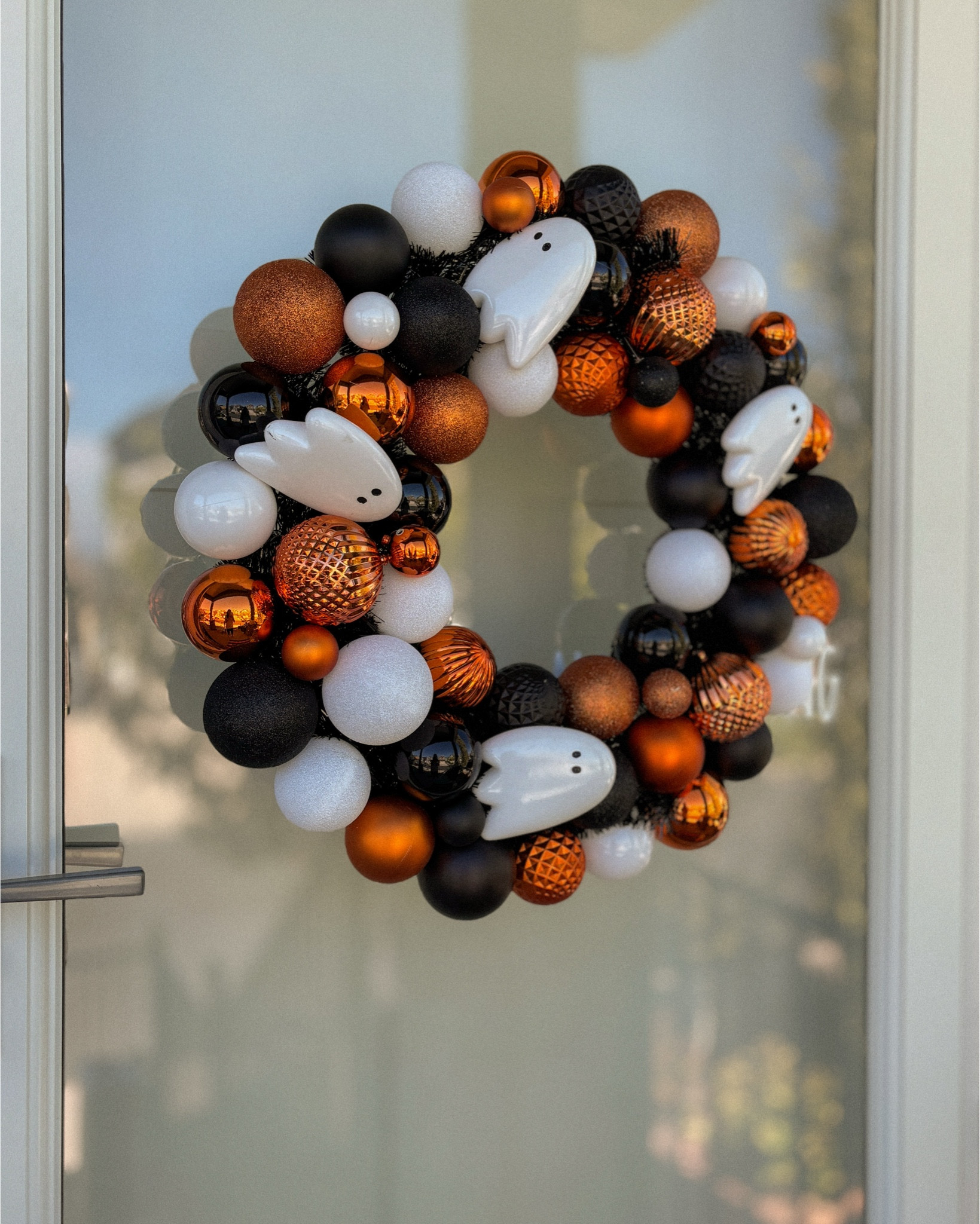Welcome brave souls and scaredy cats alike 👻🖤🎃 This Ashland Halloween wreath is packed with black & orange sparkle and the cutest little ghosts—perfect for greeting trick-or-treaters with a playful fright! 🕸️✨

#HalloweenDecor #FrontDoorDecor #SpookySeason #HomeDecor #AshlandWreath #LTKHoliday #Halloween2025 #FallDecor #FrontPorchDecor #SpookyCute 

#LTKHome #LTKFallSale #LTKHome #LTKSeasonal