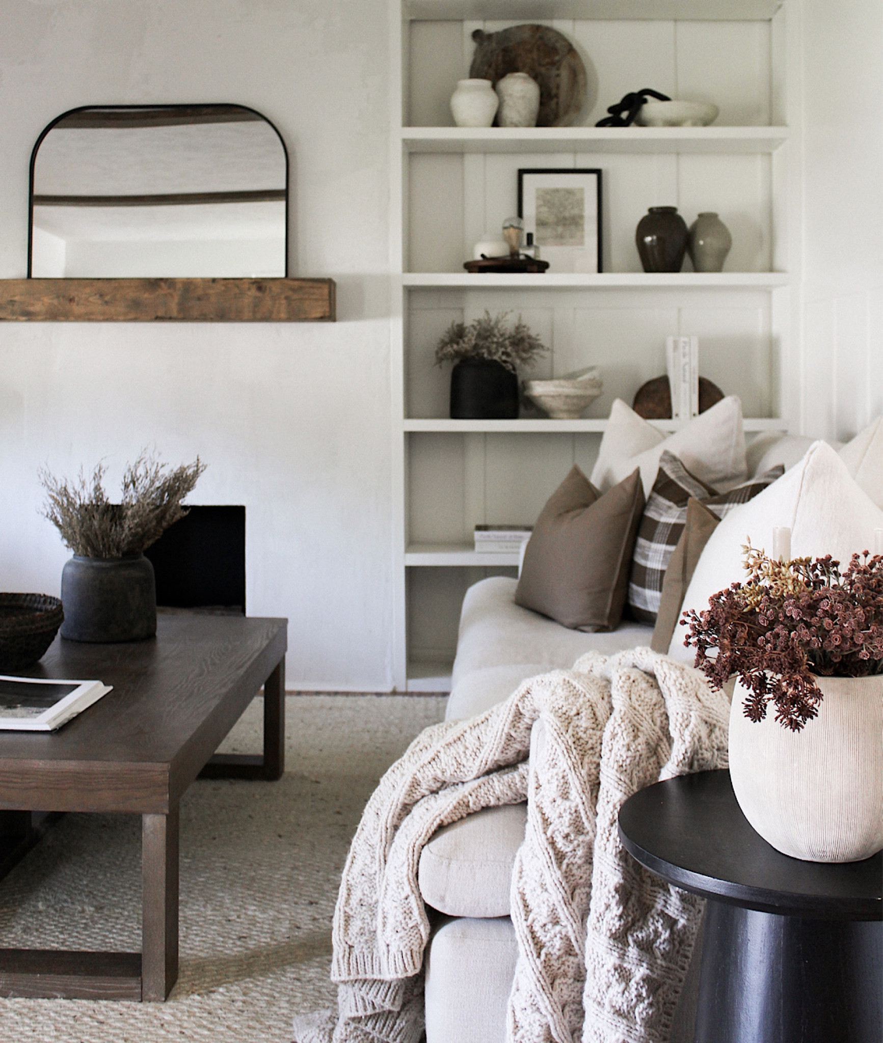 fall shelf decor - living room built ins 

Home decor. Shelf decor. Neutral rug. Jute rug. Knit throw blanket. Fall florals. Fall pillows. Coffee table. Arch mirror. Living room  

#LTKfindsunder50 #LTKhome #LTKSeasonal