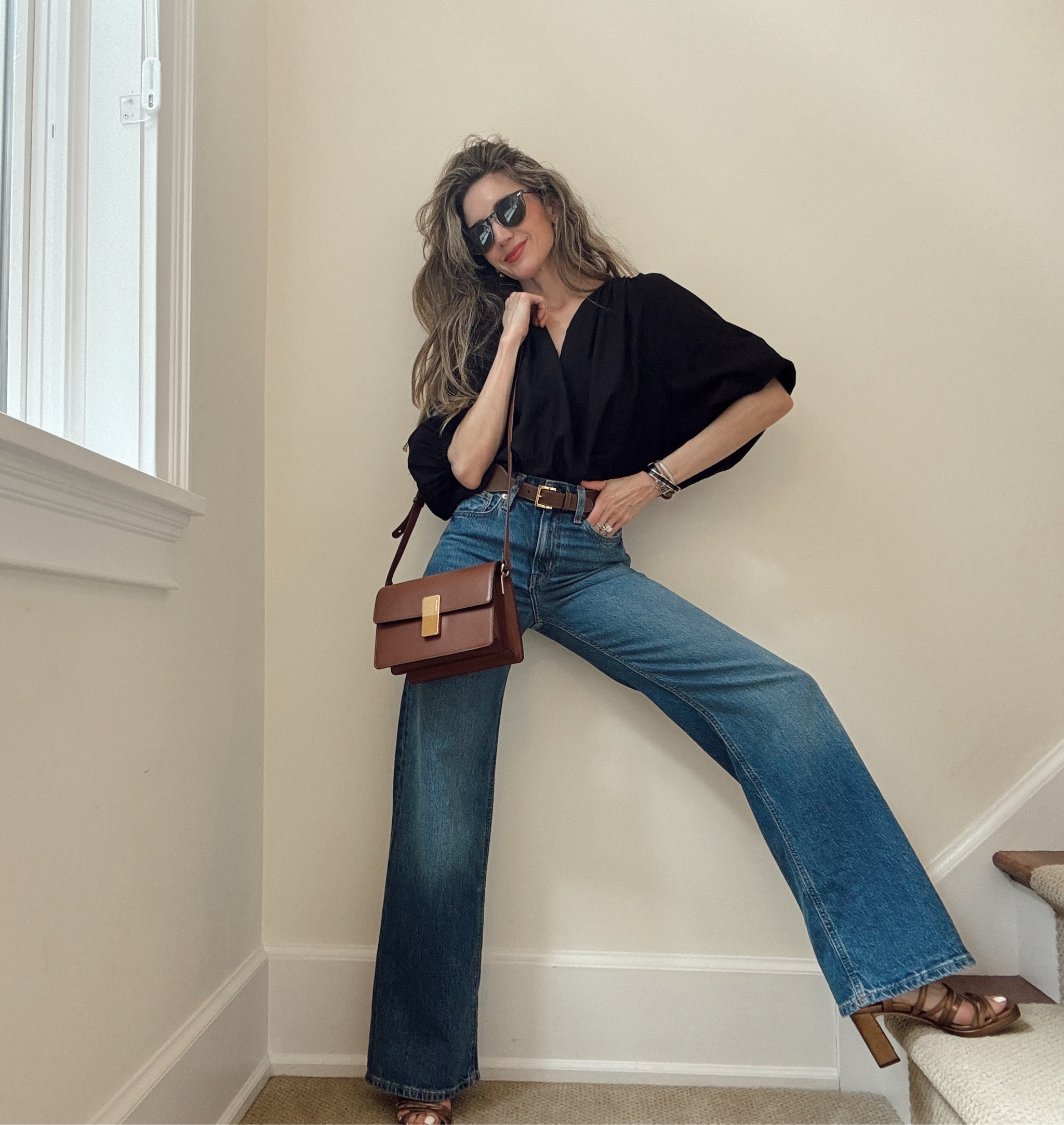 The perfect wide leg jeans and balloon sleeve top for that classic look💯 tts in all! Also my Inez strappy sandals are 15% off with code ziba15off

#LTKSeasonal #LTKFindsUnder50 #LTKWorkwear
