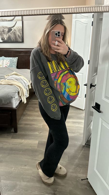 Soft, comfy and oversized Nirvana crewneck sweatshirt is perfect for growing baby bump too! Wearing the small medium, 5'8", in my 3rd trimester. Sleeves are nice and long! 👏🏼 Love it so much! Comes in two colors. Maternity flare leggings for $12 and my favorite slippers that have lasted 3 years already!

#LTKMostLoved #LTKbump #LTKfindsunder100