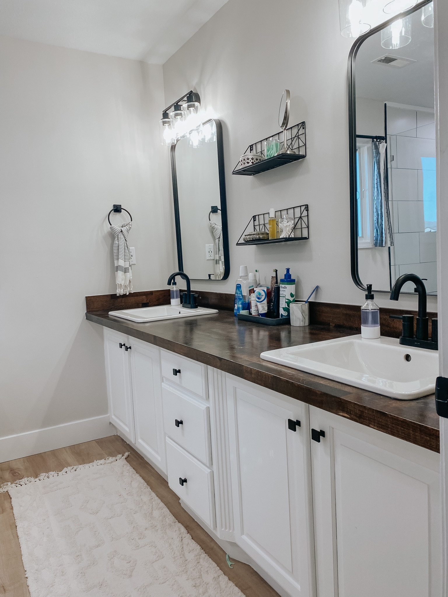 We completely flipped this master bath! Painted the vanity, replaced the countertop with stained butcher block, new floors and whole new shower. I’m obsessed!

#LTKunder50 #LTKhome #LTKfamily
