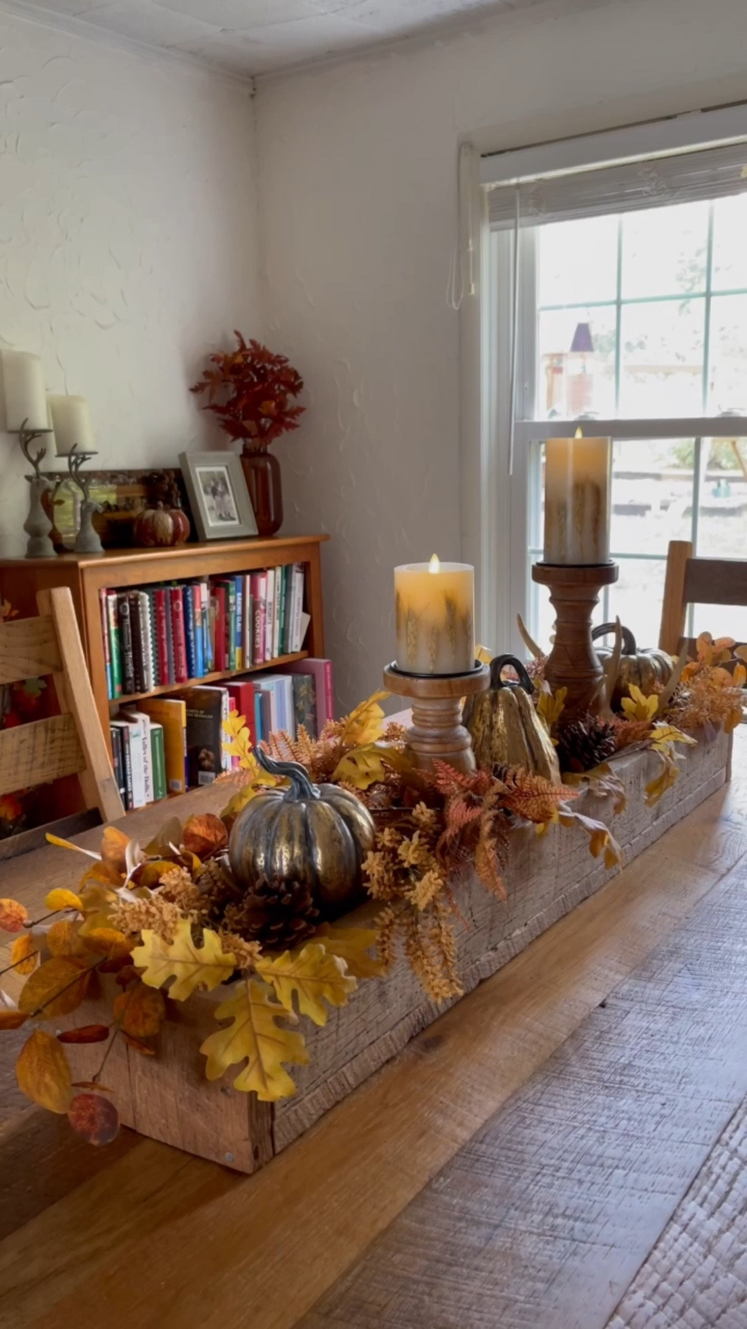 Fall dining room table decor with pumpkins, fall leaf stems and battery operated candles

#LTKHome #LTKSeasonal #LTKSaleAlert