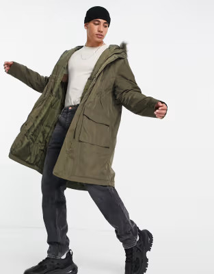 ASOS DESIGN parka jacket in green with faux-fur trim hood | ASOS | ASOS (Global)