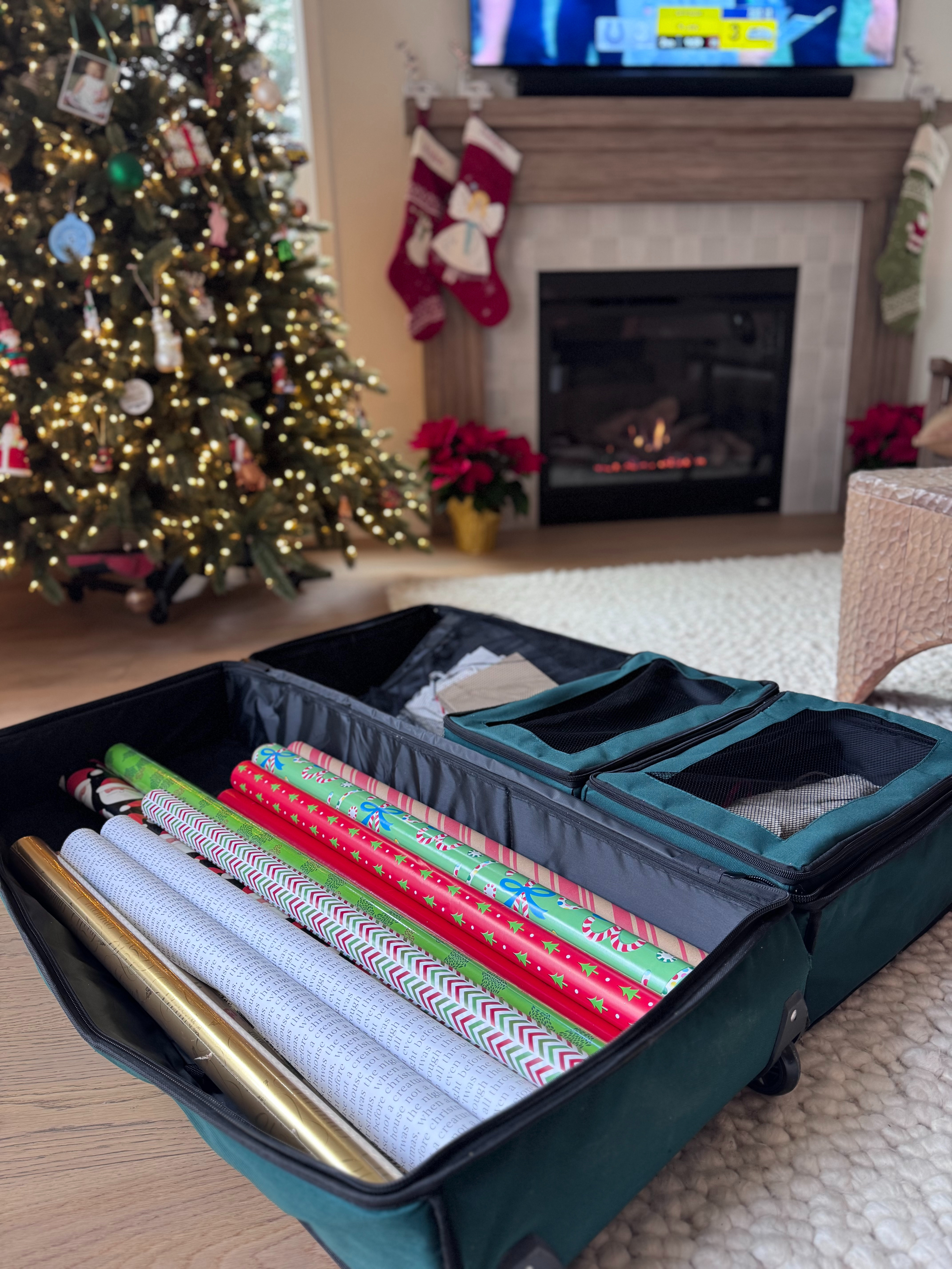 The best way to store your Christmas gift wrap and accessories - wrinkle free! So many compartments and it's on wheels. 

 #LTKHoliday #LTKSeasonal #LTKHome