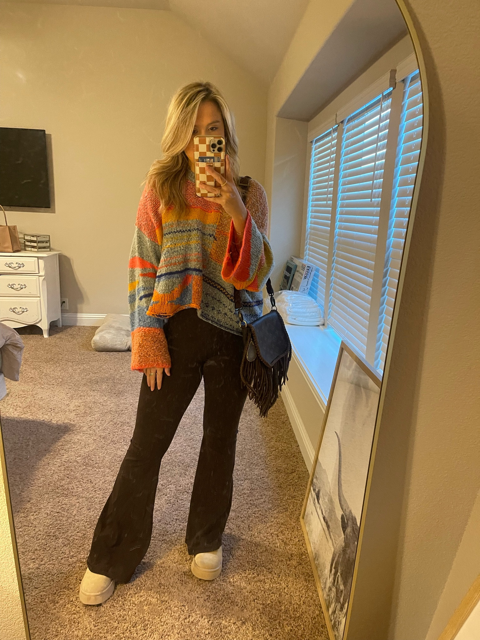 Platform boots from Altar’d State
Flare leggings from Aerie
Sweater is sold out from Francesca’s 
Purse is Vintage Boho Handbags 

#LTKSaleAlert #LTKItBag #LTKShoeCrush