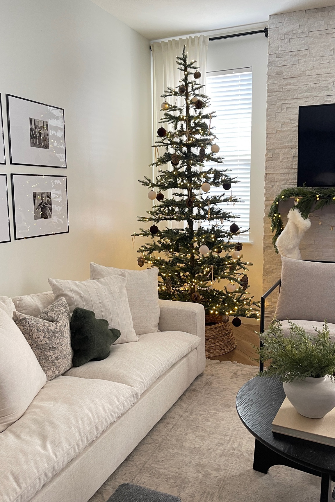 Neutral christmas with white sofa and a king of christmas noble fir tree. Cozy and modern Christmas decor

#LTKhome #LTKHoliday #LTKSeasonal