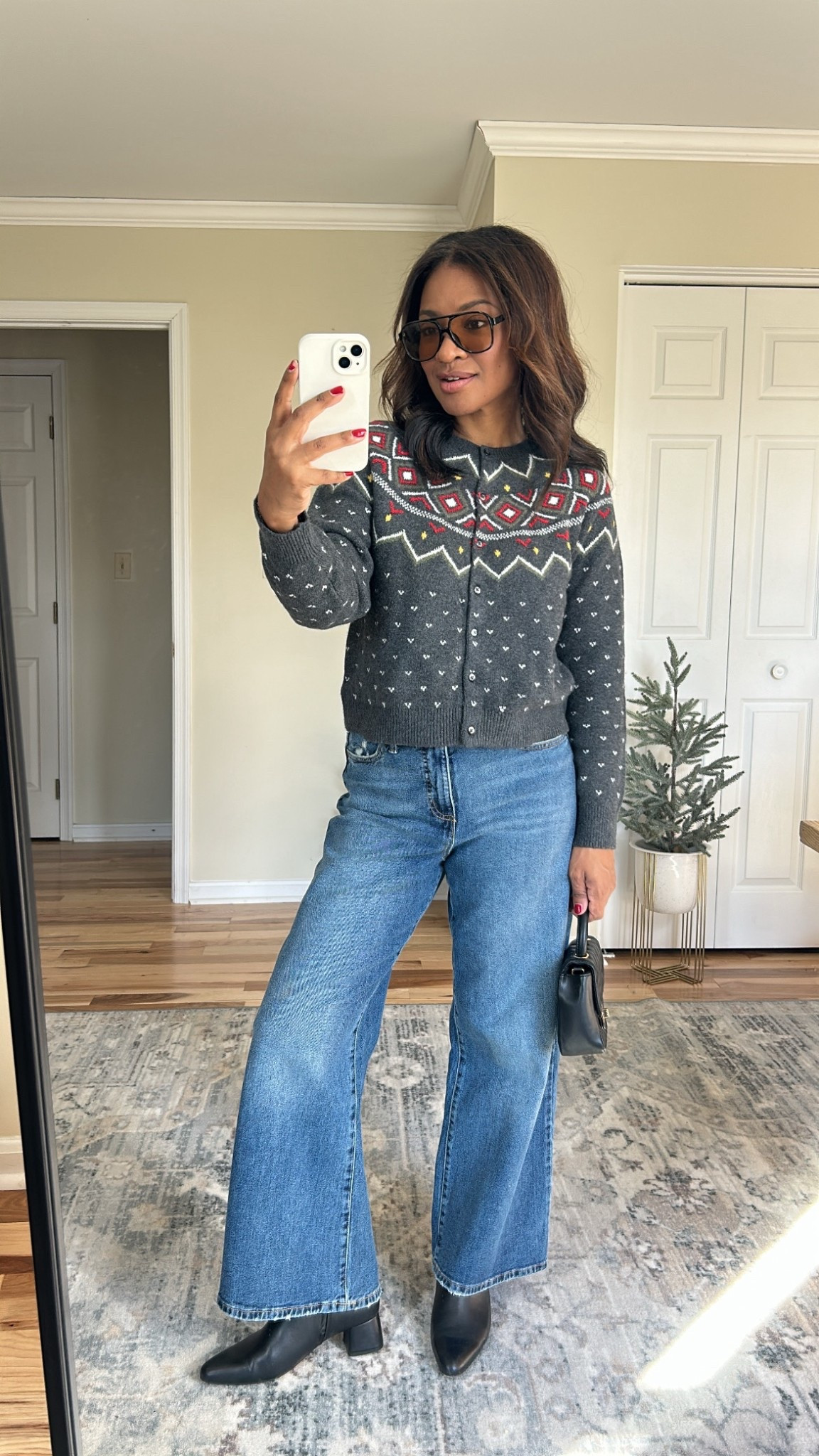 Cutest holiday sweater! Wearing a small. Size 4 in the jeans 

#LTKFindsUnder50 #LTKCyberWeek #LTKHoliday