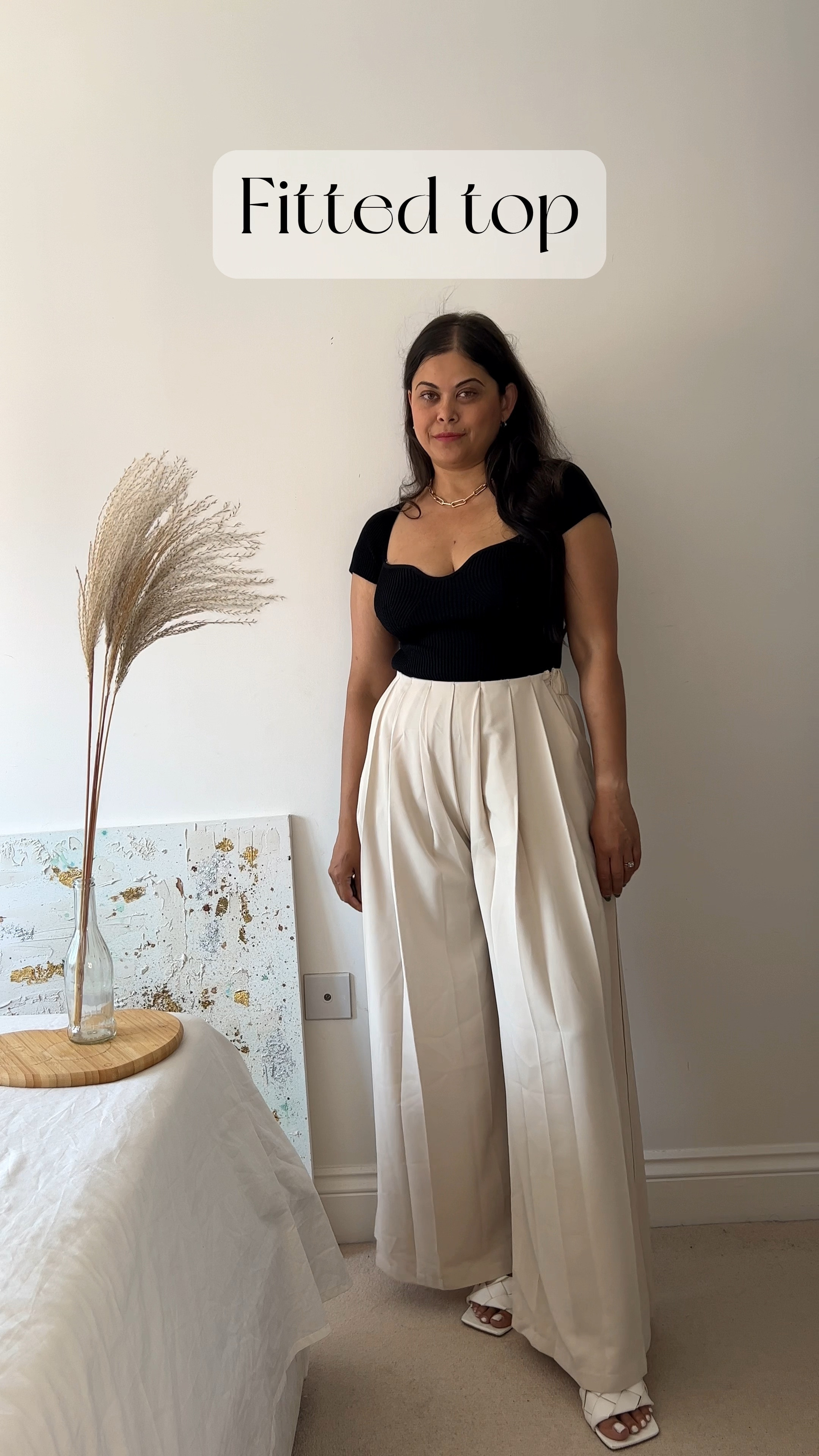 Here are three ways to wear a pleated high waist trouser - one trouser three ways!
Cropped fit - Going for a cropped shirt breaks the outfit nicely and shows off the pleated trousers perfectly giving you that relaxed yet chic vibe.
I am wearing the FRONT TIE FLAP POCKET
CROP SHIRT IN IVORY from Chicwish

Fitted look - Wear a nice fitted top with a beautiful sweetheart neckline in contrasting colours to give your outfit that punch! This can easily be made into a day to night look. I am wearing U-SHAPE WIDE COLLAR FITTED KNIT TOP IN BLACK from Chicwish

Oversized- go for a oversized shoulder to just an oversized top in general, to give your outfit a bit more structure. SATIN TIE BACK SLEEVELESS TOP IN LIGHT YELLOW From Chicwish.

#LTKeurope #LTKFind #LTKstyletip